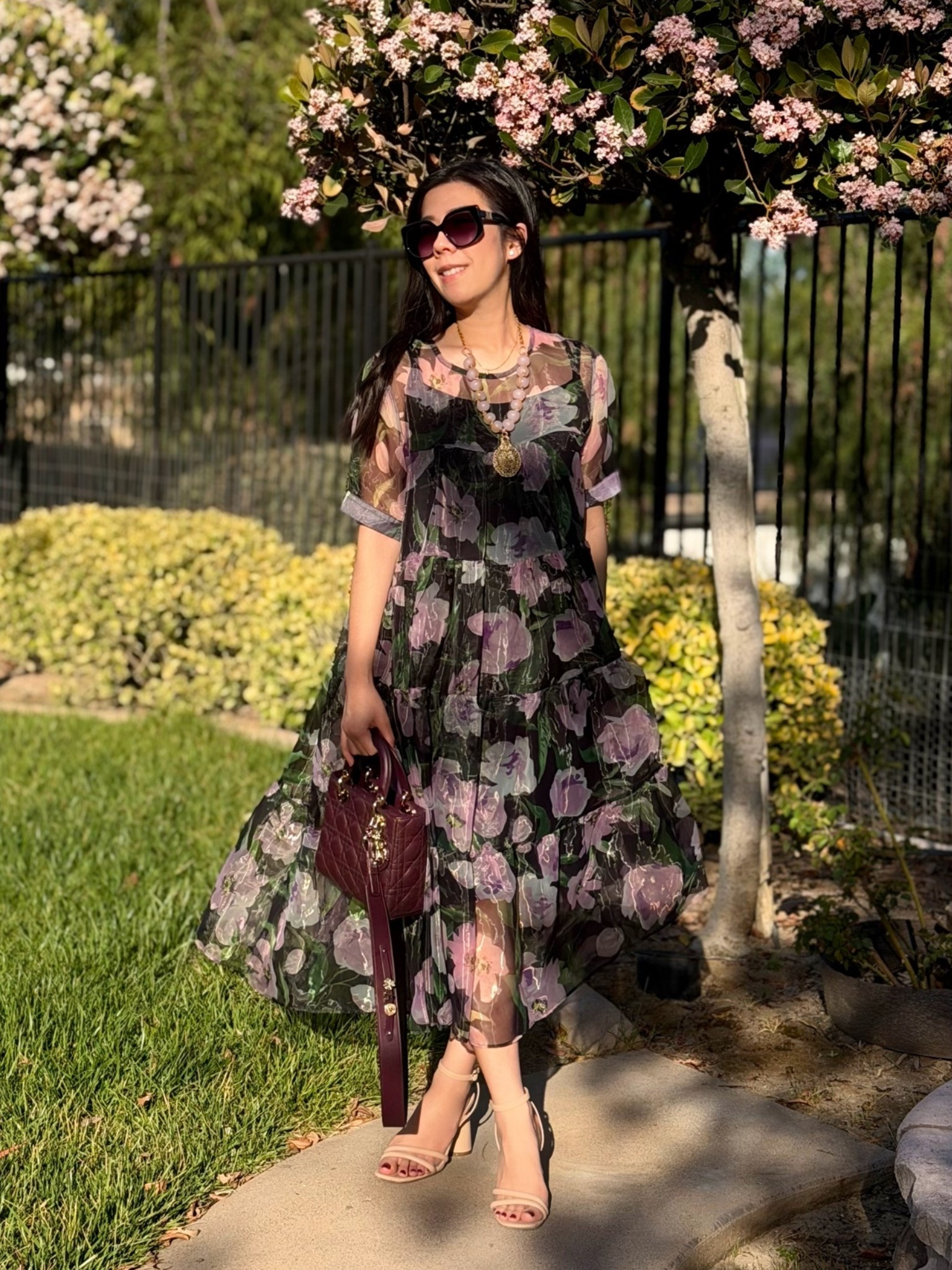 Can you believe this is the first time I’m wearing an organza dress as an adult? I’ve had some other mixed media ones but this is a full head to toe look with that fabric! This is the perfect spring maxi dress that’s perfect for a garden party or any other gathering! I paired this lilac and pink toned dress with my amaranth Lady Dior and nude strap block heels for a day out in La Jolla. 

#gardenparty #maxidress #organza #modestdress #datenightdress

#LTKPetite #LTKootd #LTKSaleAlert