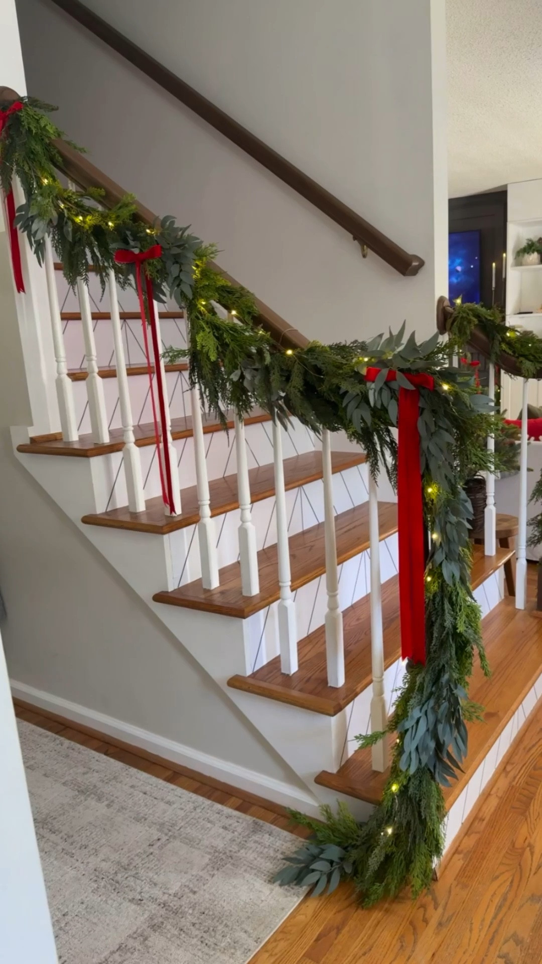 My stairway garland: 
I used a combination of:
•cedar garland 
•cedar/eucalyptus mix garland 
•twinkle lights
•velvet ribbon 


(my exact cedar mix garland is no longer sold- I’ll link this years version and also a eucalyptus garland that you could use instead)… 


#LTKSeasonal #LTKHoliday #LTKHome