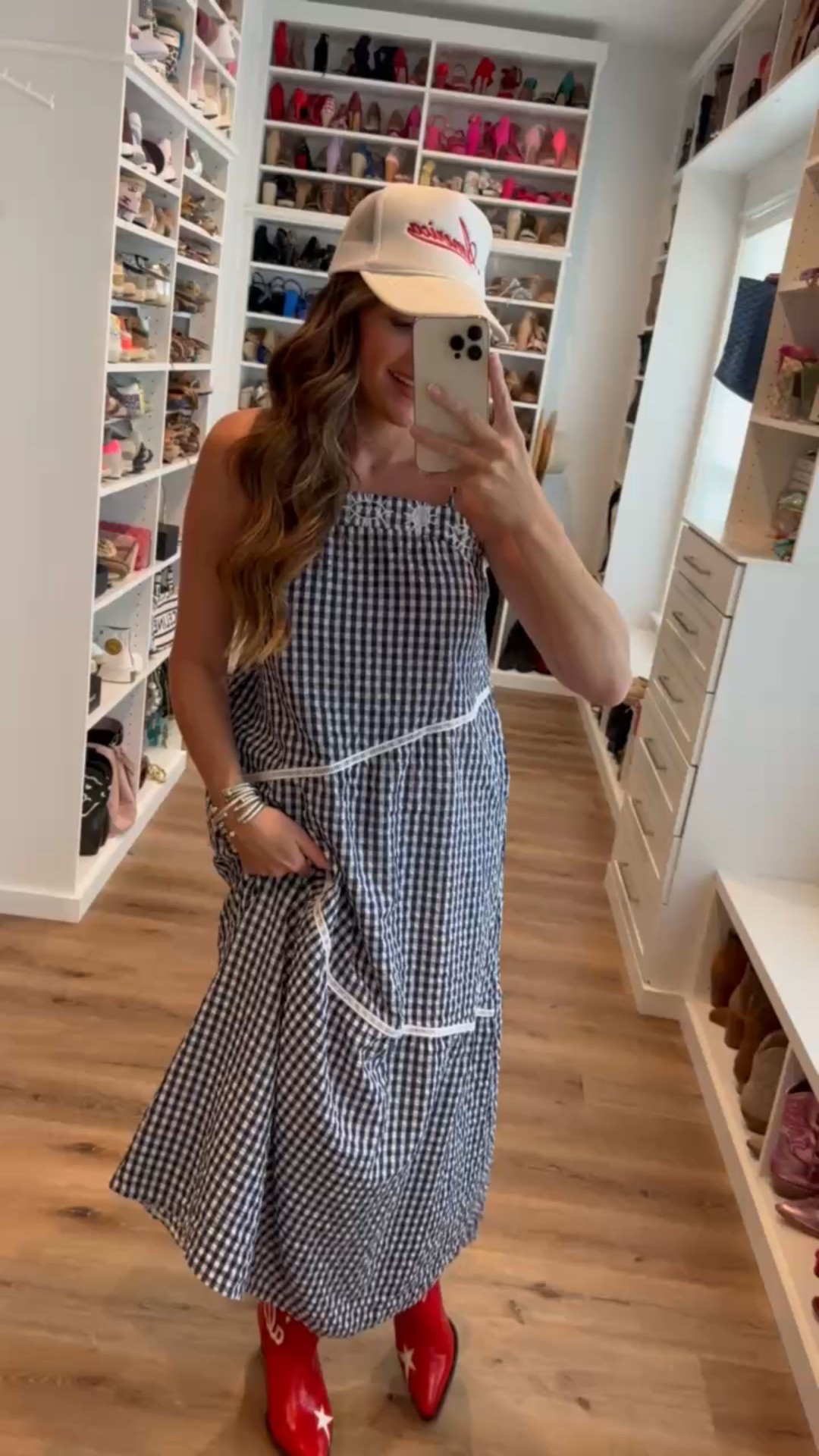 In a medium asymmetric boho maxi, America hat, red cowboy boots and accessories for patriotic look- fits tts.

#LTKSeasonal #LTKStyleTip #LTKFindsUnder50