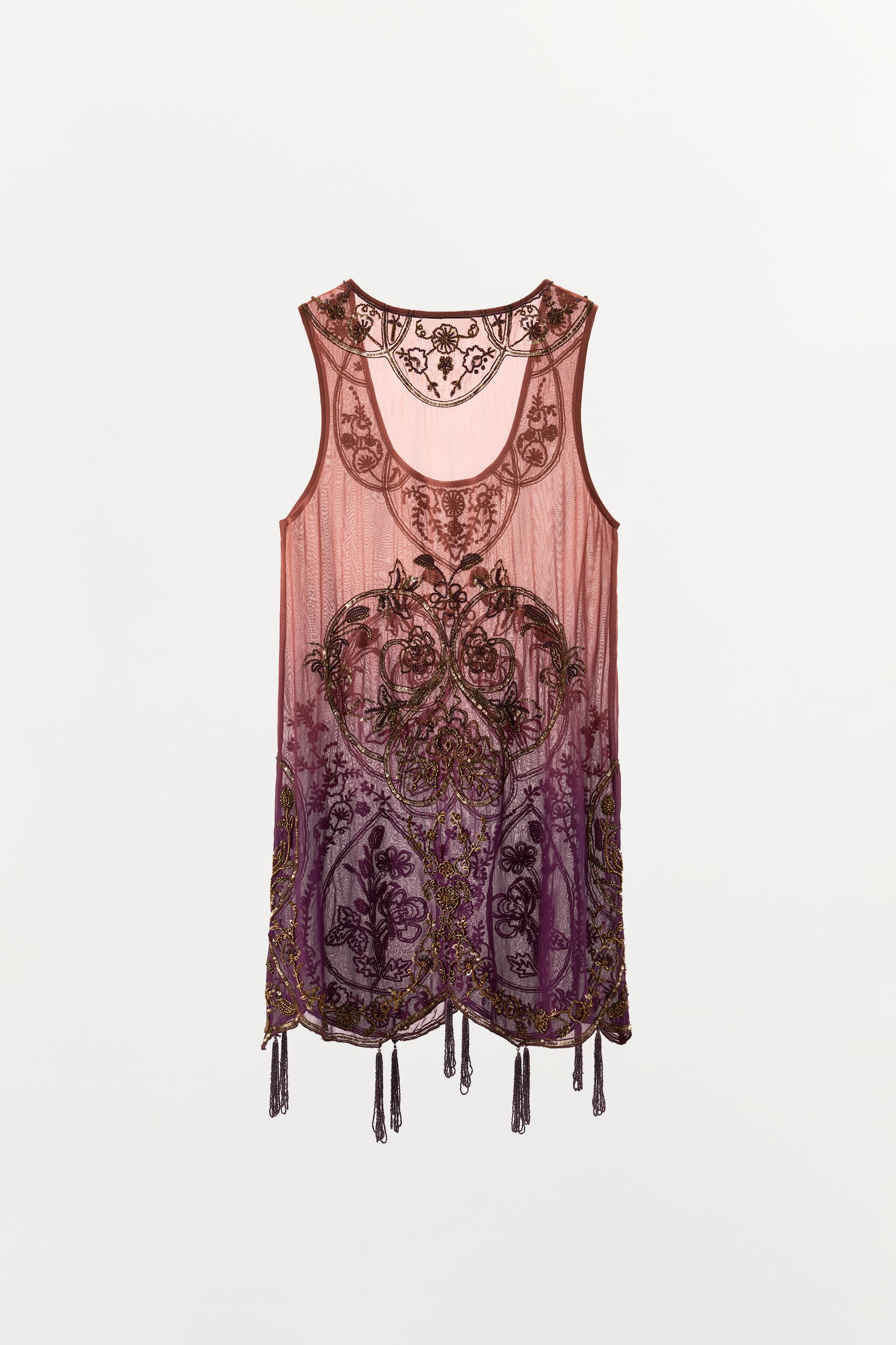Printed mini dress made of 100% viscose. Round neckline and sleeveless. Contrasting bead and sequ... | Zara US