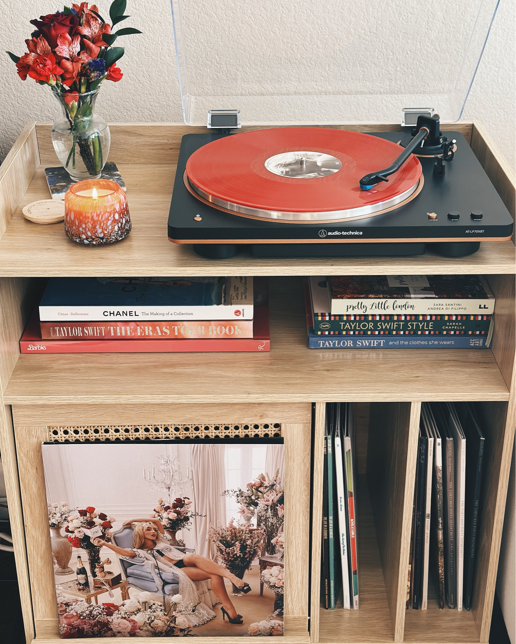 I love the design of this record player stand and how functional it is! The raffia cabinet lifts up to store more vinyls, which is perfect for my growing collection 😍🎶

#LTKHome
