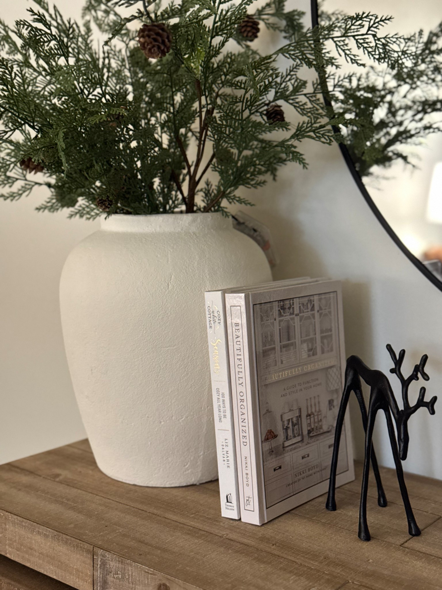 Console styling, Christmas console styling, metal reindeer, white vase, Christmas stems, led stems, coffee table books, pottery barn, wayfair, world markett

#LTKHome #LTKSeasonal #LTKSaleAlert