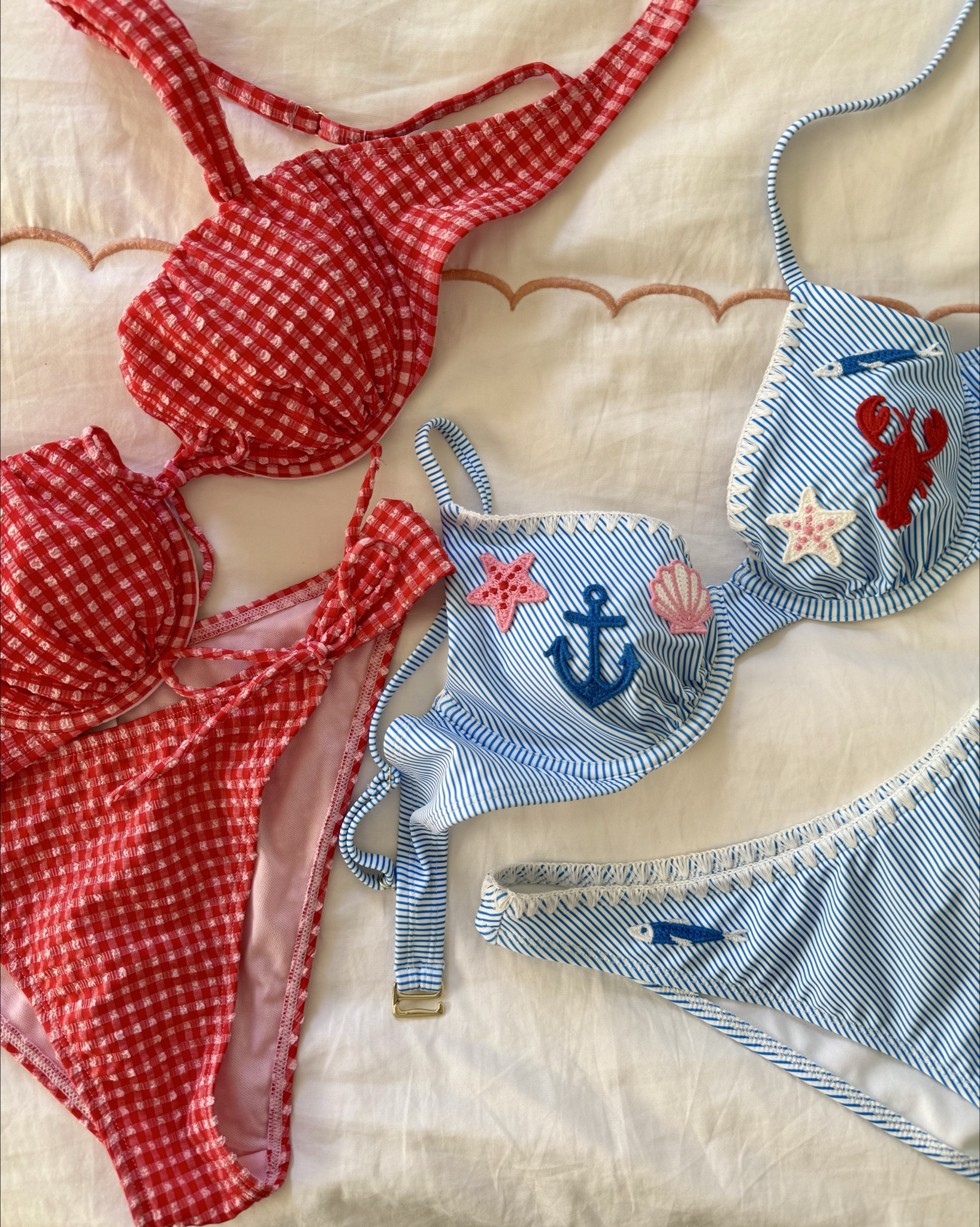 Love these cheerful new bikinis! The nautical cases are ridiculously cute, and I can’t resist gingham. On sale! ￼

I took my regular size small in the tops (I am a 34B), did a medium in the red bottoms, and a small and the blue bottoms. ￼￼

#LTKSpringSale #LTKSeasonal #LTKSwim