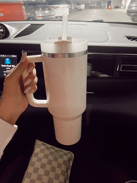 Stanley Quencher 40 oz. Cream - I’ve used this multiple times a day since I got it! Helps me stay hydrated plus fits in cup holders!! Neutral Style, Lifestyle, #HollyJoAnneW

#LTKunder50 #LTKGiftGuide #LTKfit