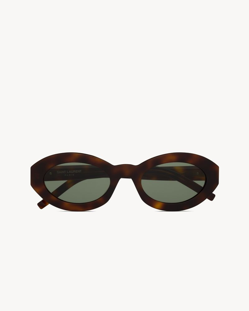 tortoiseshell sunglasses with oval acetate frames and nylon lenses. | Saint Laurent Inc. (Global)