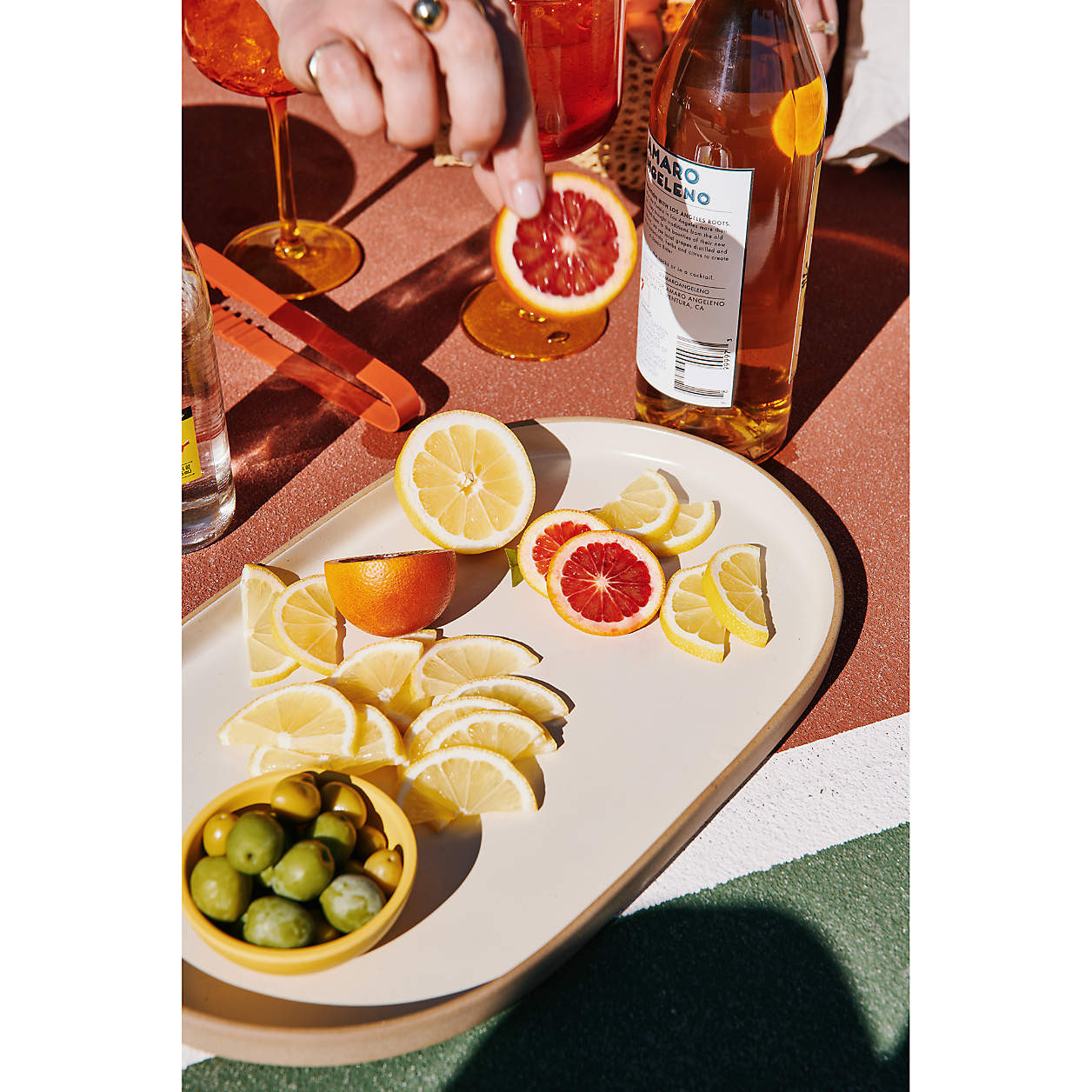 Butter Yellow Oval Stoneware Serving Platter by Molly Baz | Crate & Barrel | Crate & Barrel