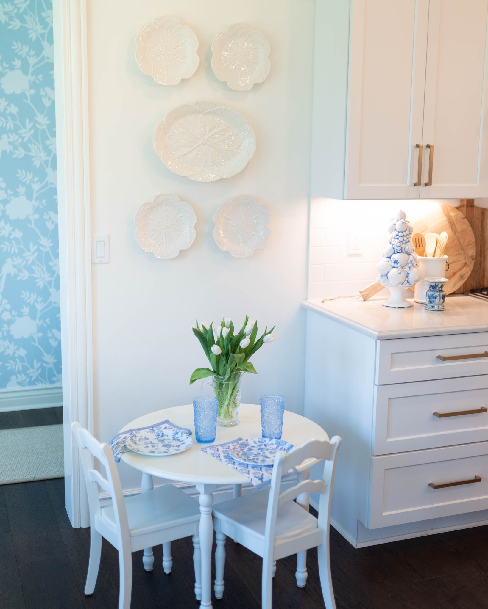 Kids table in our kitchen! It was hands down the best purchase! 

Charlie & Will eat breakfast here, have snacks and it’s an easy place for crafts! 

Get marks on it - no problem! - use a magic eraser! 

The blue and white plates are melamine and kid friendly, so won’t break. 

#LTKkids #LTKhome #LTKfamily