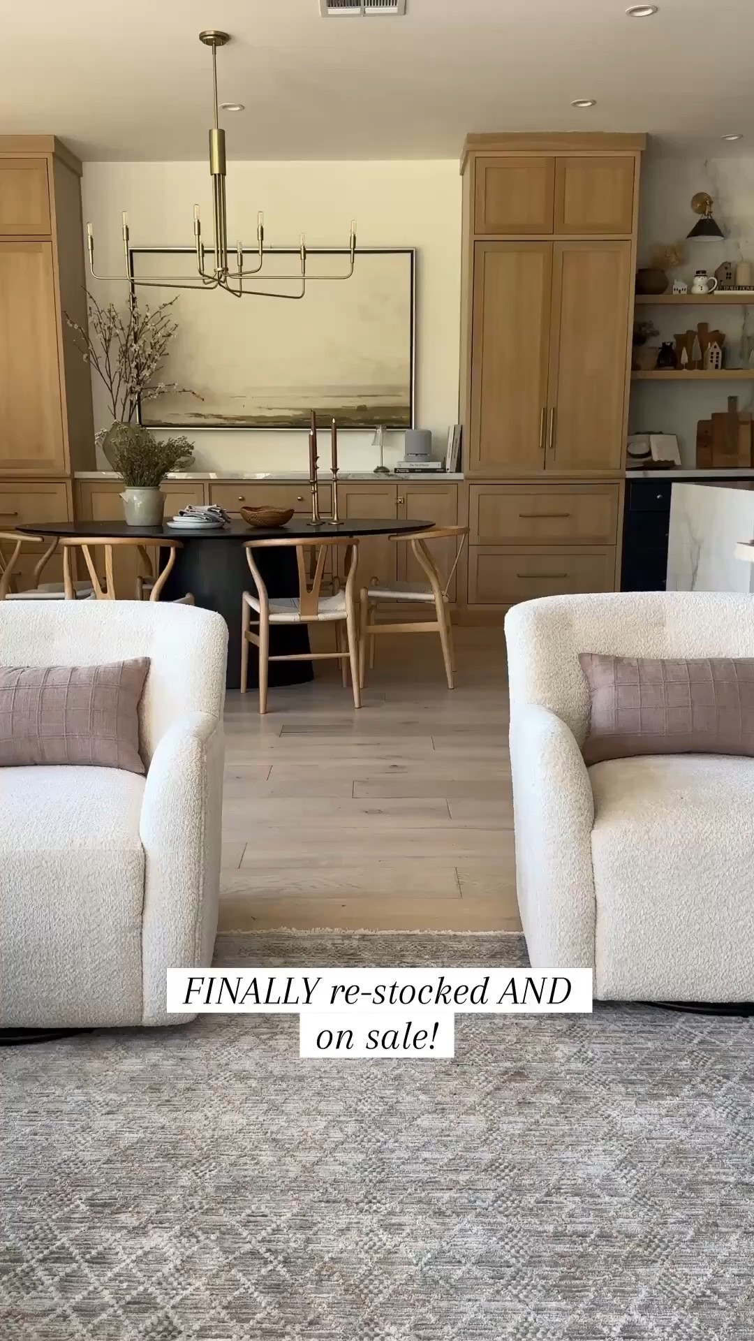 The design is gorgeous and has such a pretty wood tone with an amazing price point.  Every furniture in this space is pretty much from Wayfair.  It’s my go-to for quality pieces at every price point — from designer to budget-friendly. From elevated to affordable, quality, and style we’ve created so many beautiful rooms for every client as well as my own home. 

Black oval, dining table, wishbone chairs, wood side table swivel upholstered chairs, gray chair, white chair, brass hardware, pull latch, countertop, stools, white gray sectional gray rug, brass chandelier accent chair, reeded fluted.
#Wayfair

#LTKHome #LTKSaleAlert