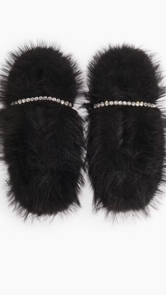 Wait until you see what I’m wearing around the house.

These aren’t just slippers. They’re a whole mood. Fluffy, dramatic, and sprinkled with just enough sparkle to make even your living room feel like a runway. The kind of glam that feels playful but still grown.

Style tip
Luxury starts at home. Slip into silk pajamas, soft knits, or a touch of faux fur and watch how the whole day shifts. Treating yourself to beautiful house clothes is a quiet reminder that you deserve softness even in the smallest moments.