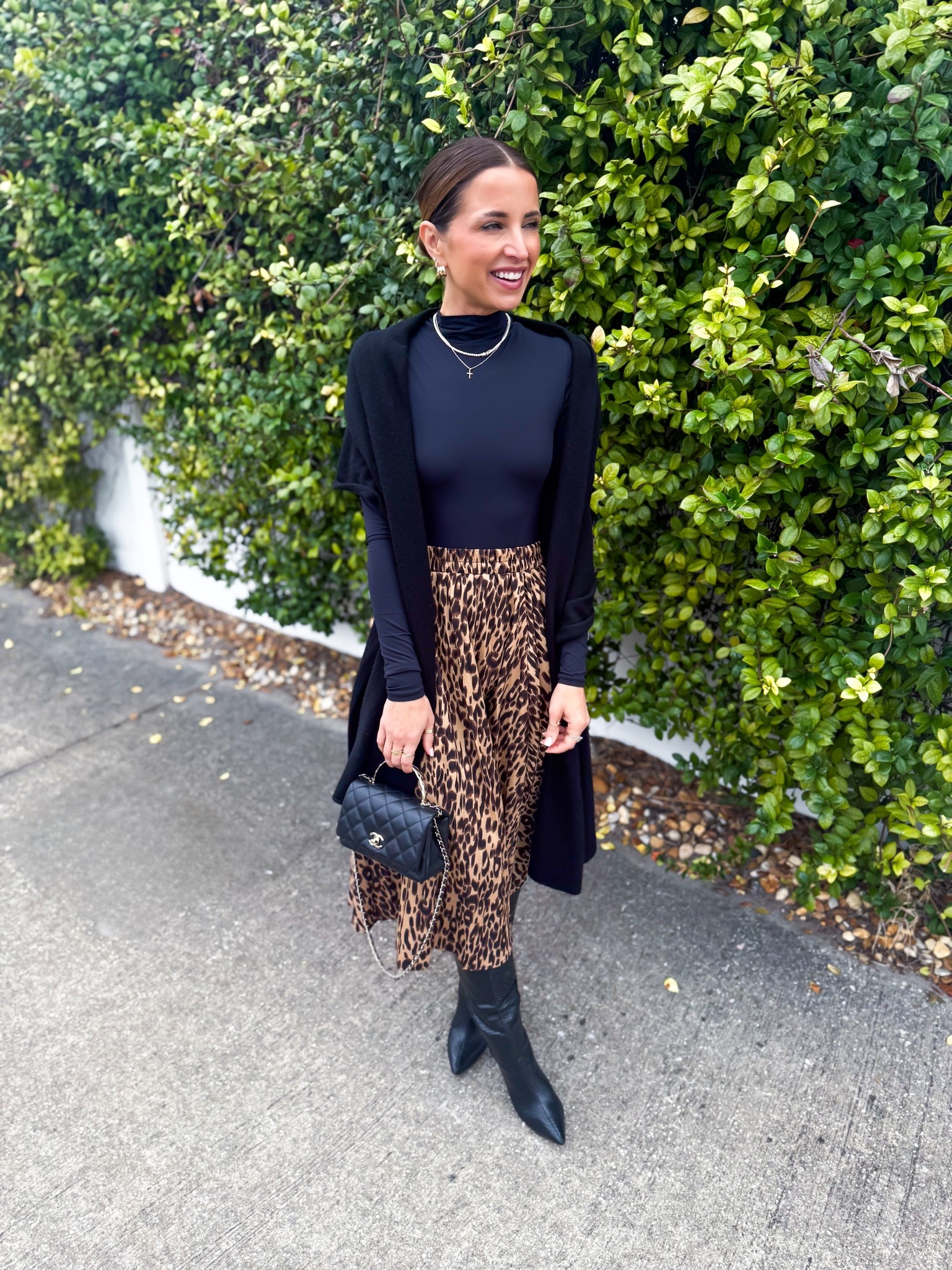 My church #ootd. Winter outfit. Spring outfit. Amazon leopard skirt in XS. Amazon seamless bodysuit in XS. Schutz Maryanna knee high boots - I went up half a size to make room for socks. Quince Cashmere wrap. 

#LTKootd #LTKPetite #LTKTravel