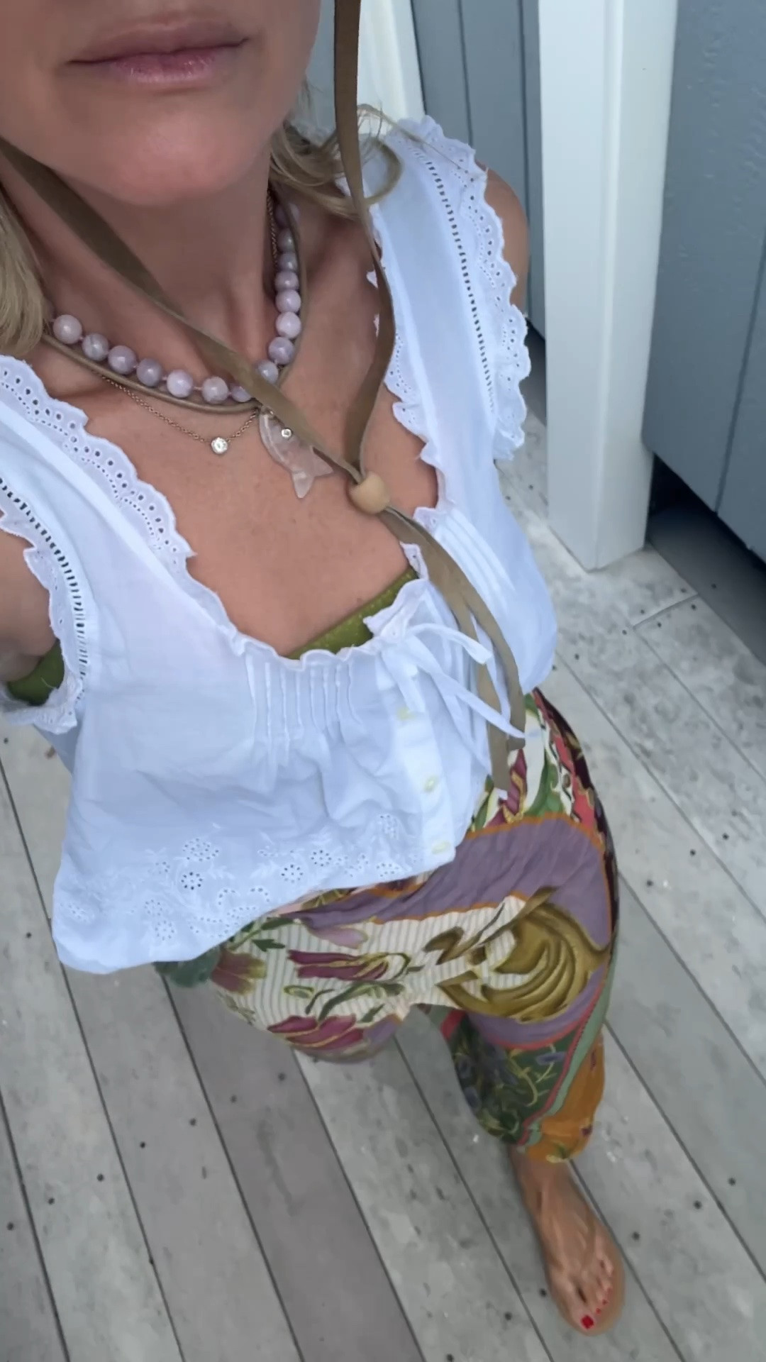 My summer uniform:
Pareo, white eyelet top, summer necklaces and flip flops. Linked some favorites for you here!