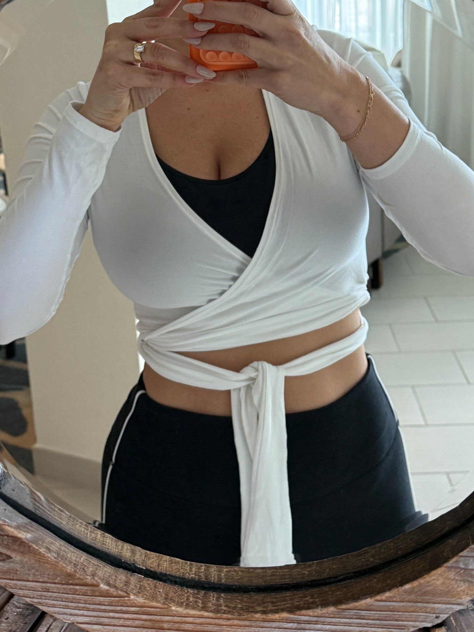 White wrap top 

#LTKActive #LTKSeasonal #LTKStyleTip