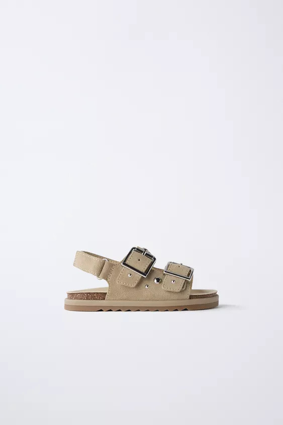 Double buckle sandals, 100% cowhide leather with stud detail. Hook-and-loop back strap closure. R... | Zara US