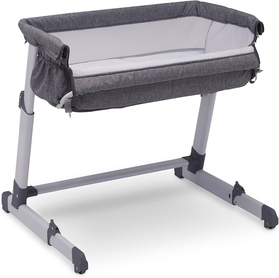 Delta Children Simmons Kids Dream Bedside Bassinet with Zip-Down Side Wall – Convenient Baby Sl... | Amazon (US)