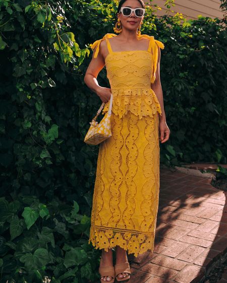 Like this yellow eyelet set, so perfect for the Spring. I am wearing size S here. Bag by Miu Miu, I linked a couple similar items here. 

#LTKFestival #LTKSeasonal