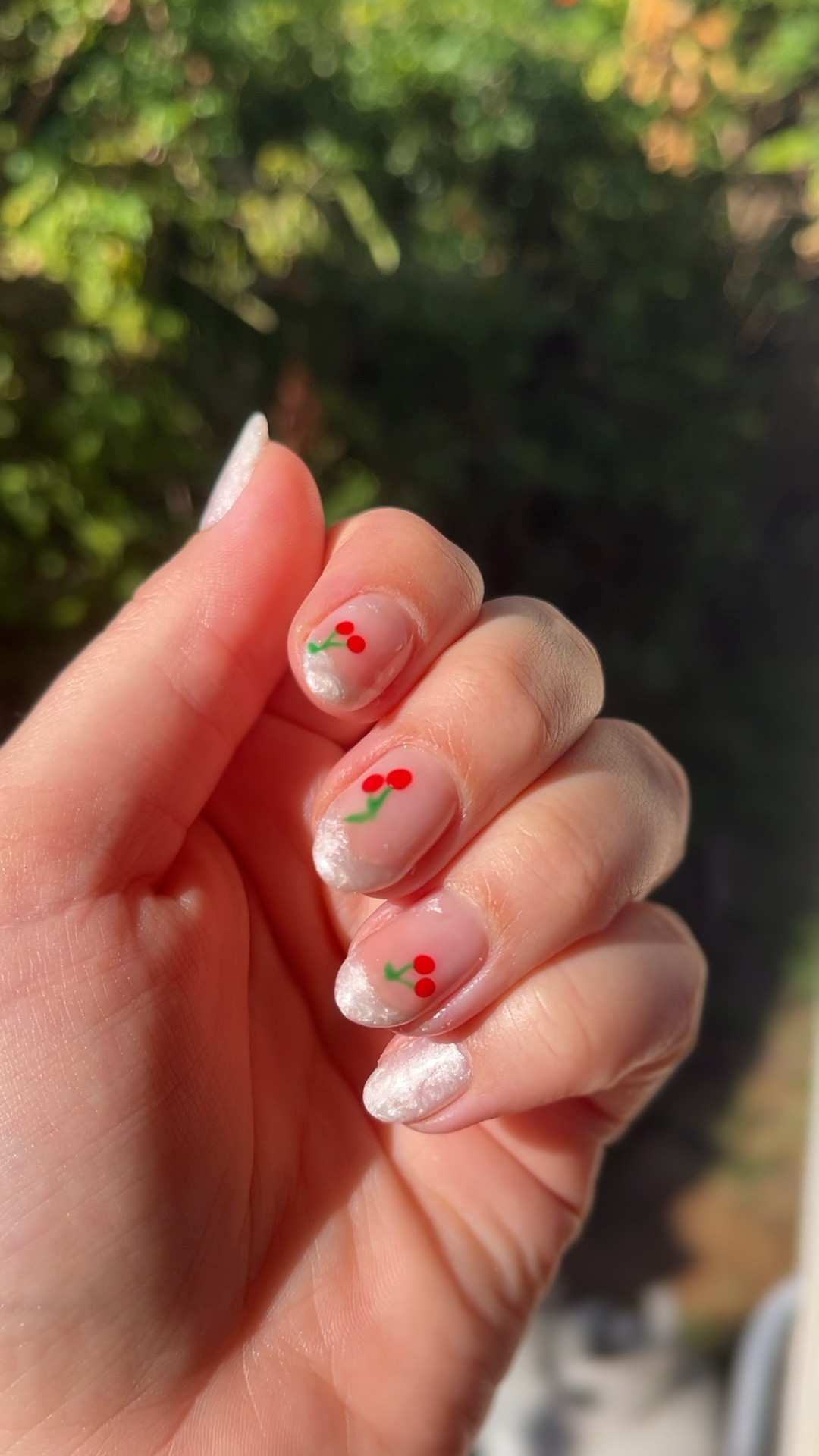 Nail inspo! Channeled guitar picks for this pearly set with cute little cherry accents! 

#LTKWedding #LTKBeauty