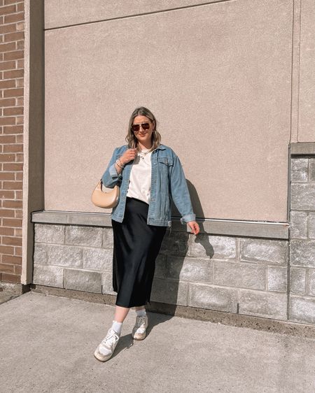 Midsize spring outfit - black satin midi skirt (size L), oversized graphic tee (L), Amazon denim jacket (M), Amazon crescent bag, neutral sneakers 

Casual spring outfits, spring style


#LTKfindsunder100 #LTKmidsize #LTKstyletip