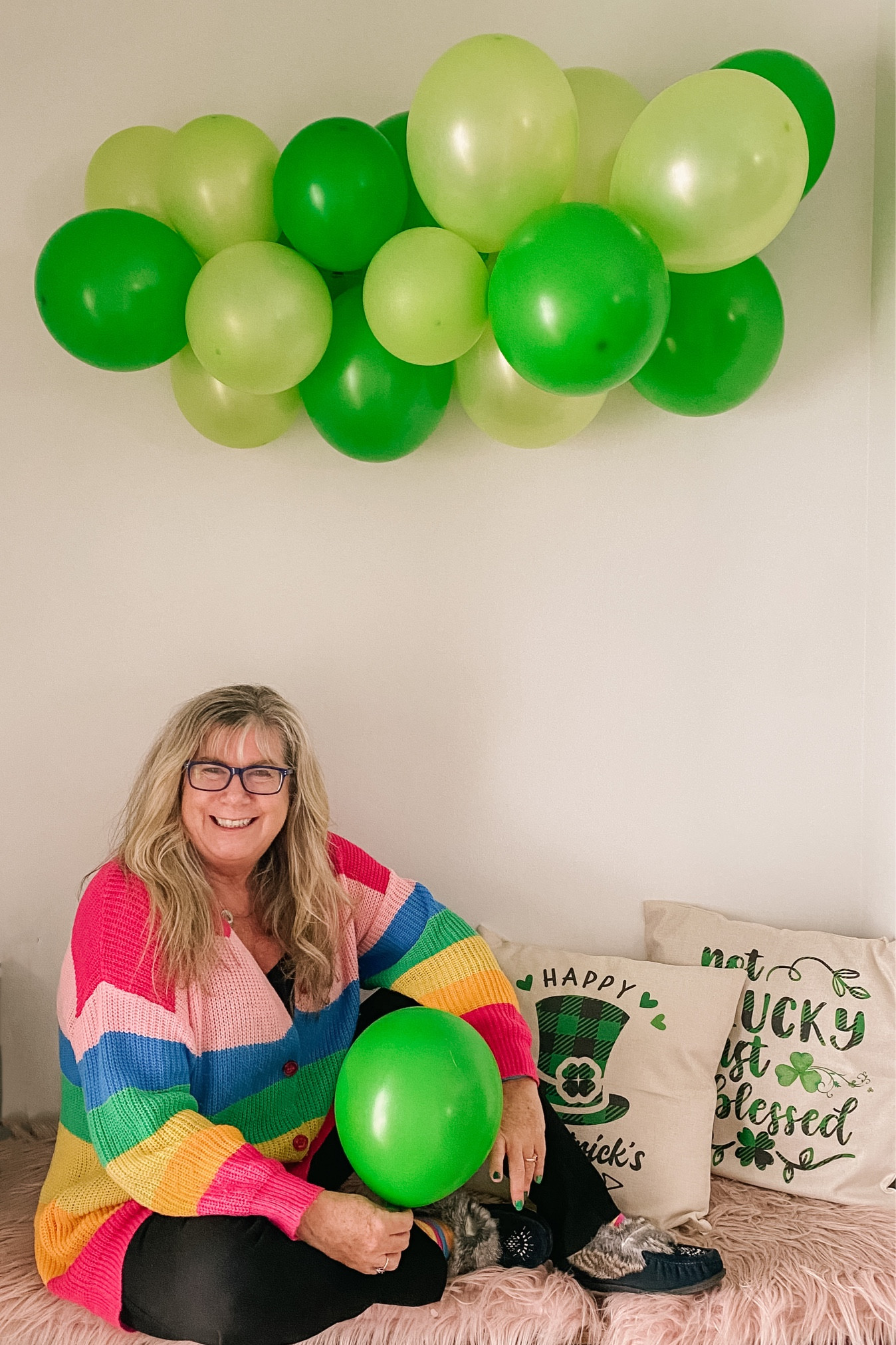 I am the rainbow under the garland. Decorating for st Patrick’s day 

#LTKunder50 #LTKSeasonal #LTKhome