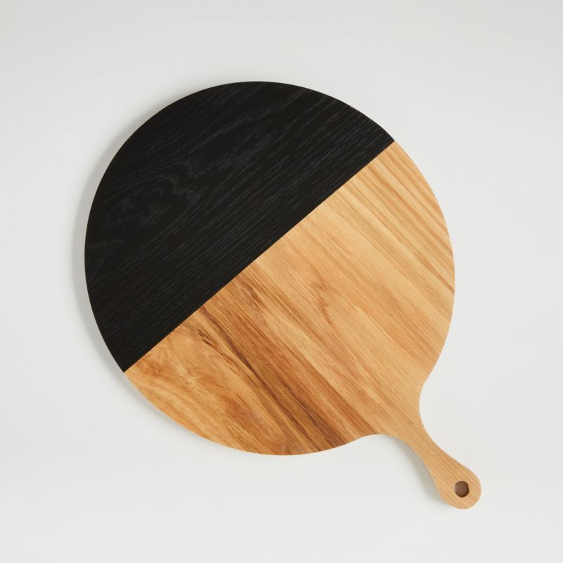 Amara Light Oak and Black Round Board | Crate & Barrel | Crate & Barrel