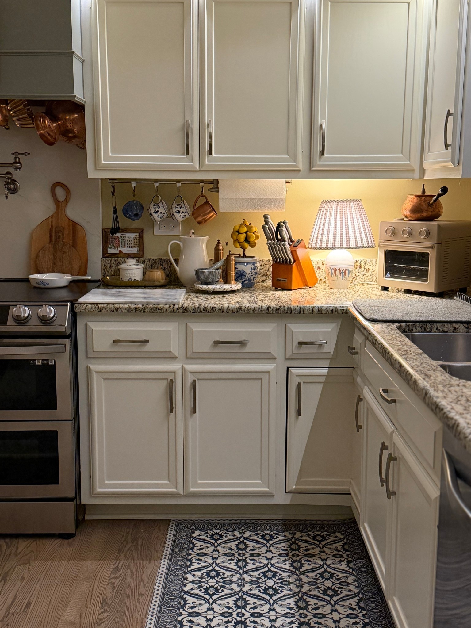 When the lights are low and the kitchen glows, this is where comfort lives. Home decor, kitchen lighting, ambient lighting, cozy kitchen, cozy decor. 

#LTKmomlife #LTKSaleAlert #LTKHome