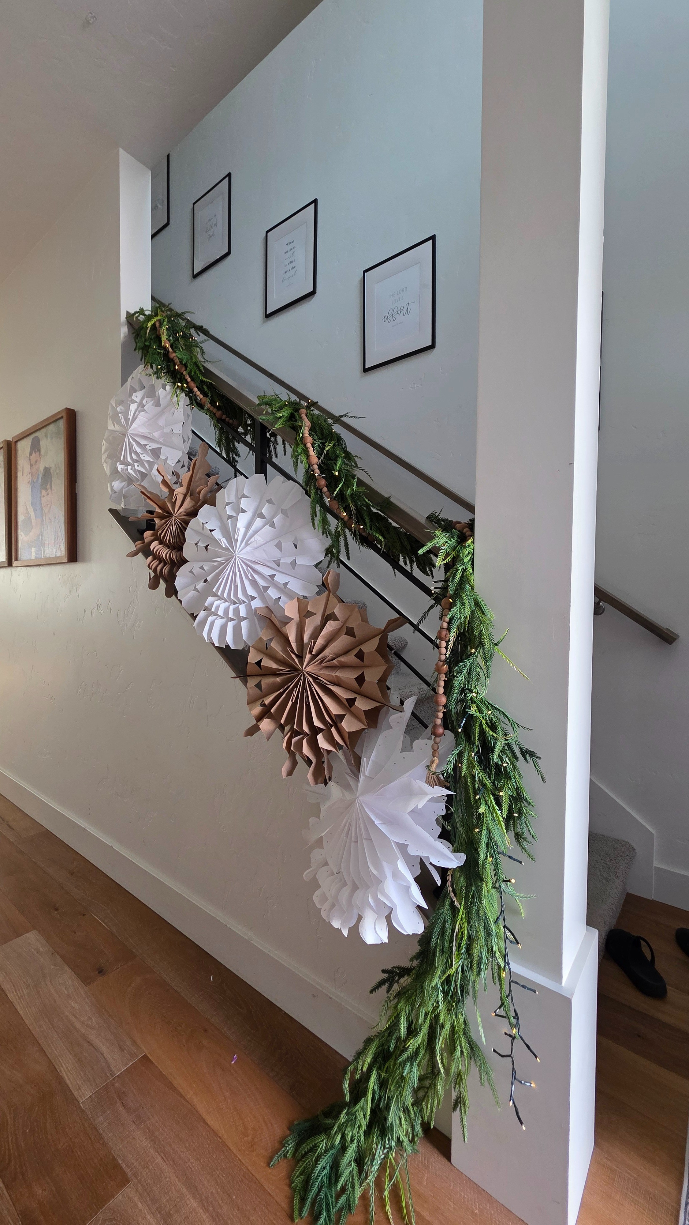 Everything you need to create this staircase look. Paper bag snowflakes, thinking lights, wood beaded garland, norfolk garland, command hooks and zip ties. 

#LTKHoliday #LTKSeasonal #LTKHome