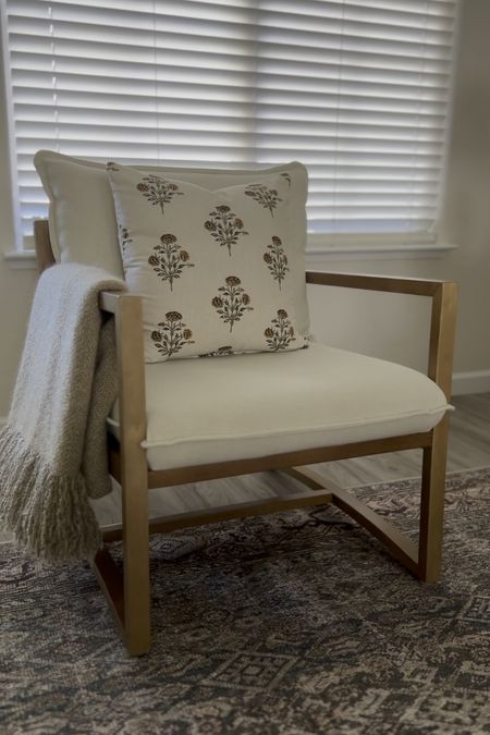 I found the prettiest throw pillow to put on my favorite armchair; and the best part is - it’s only $20! Throw pillow,  upholstered furniture, armchair, Higgins sling back chair, area rug, Studio McGee, Target, Loloi, Threshold

#LTKStyleTip #LTKVideo #LTKHome