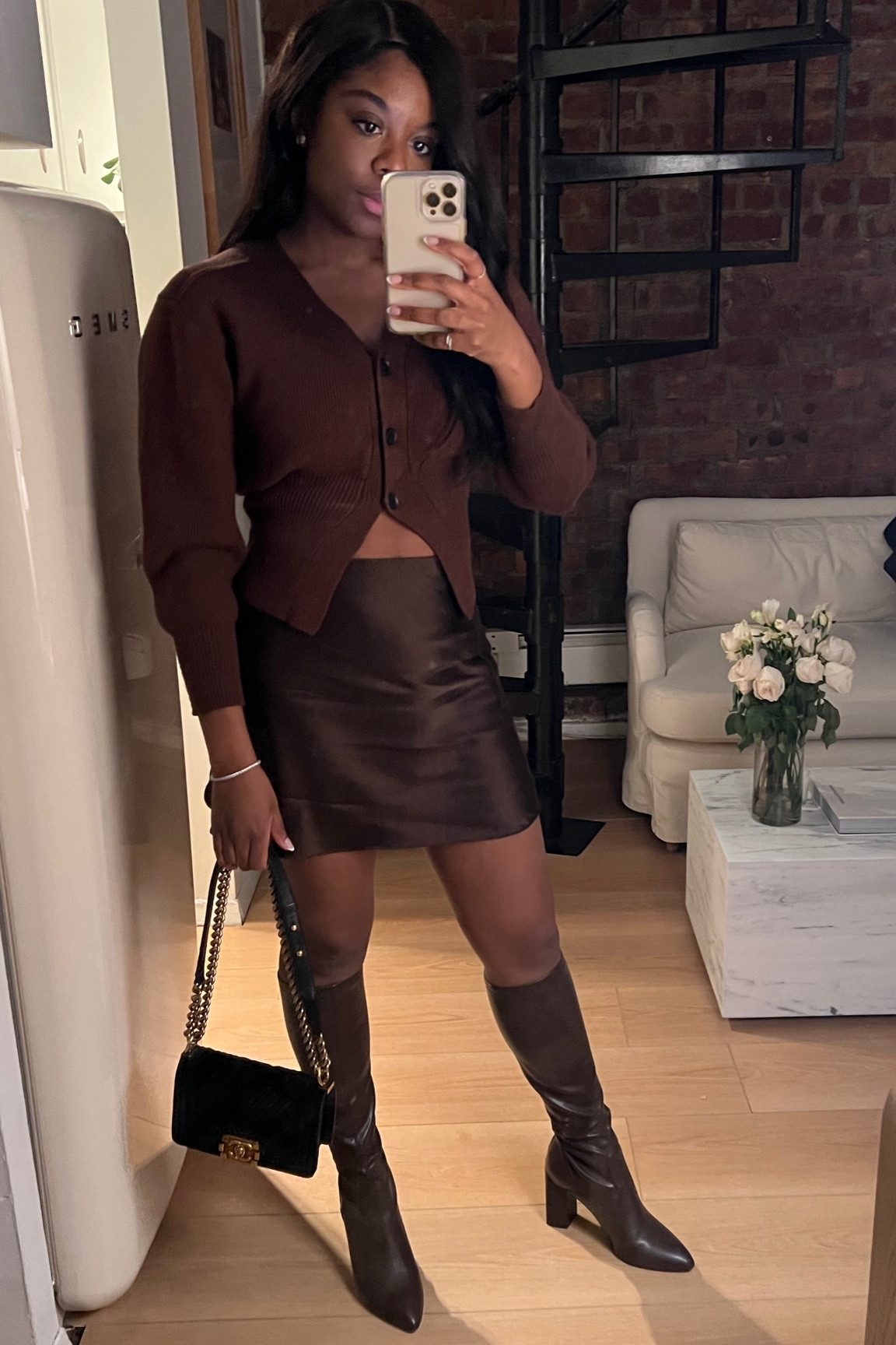 A very sweet chocolate brown moment for a winter/fall night out! Silk mini skirt, cardigan, and tall boots.
