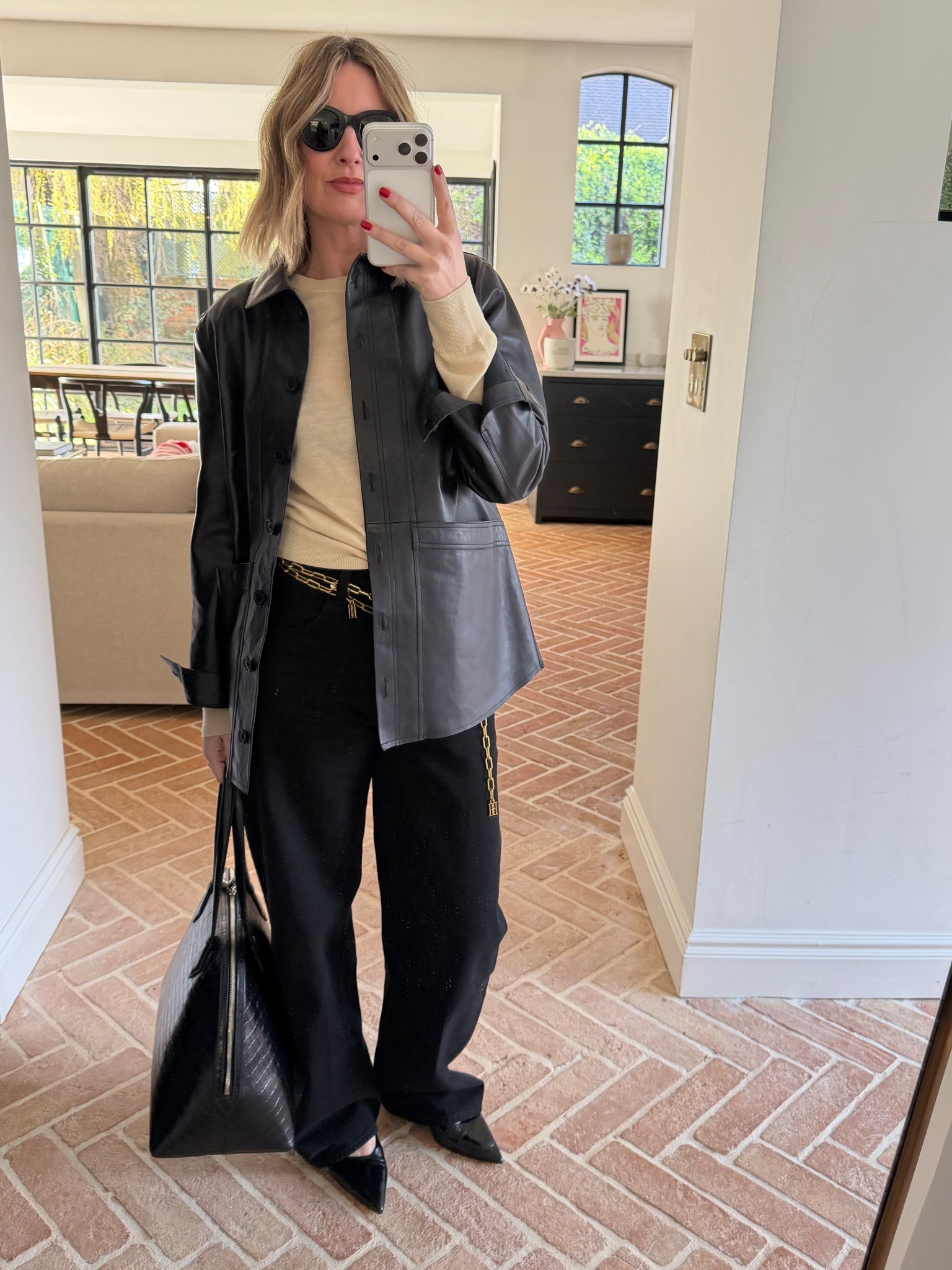 Leather Jacket + Black Baggy Jeans + Suede Mules + Leather Bag + Chain Belt | Sezane | NET-A-PORTER | Suede 

 #LTKuk #LTKspring #LTKeurope