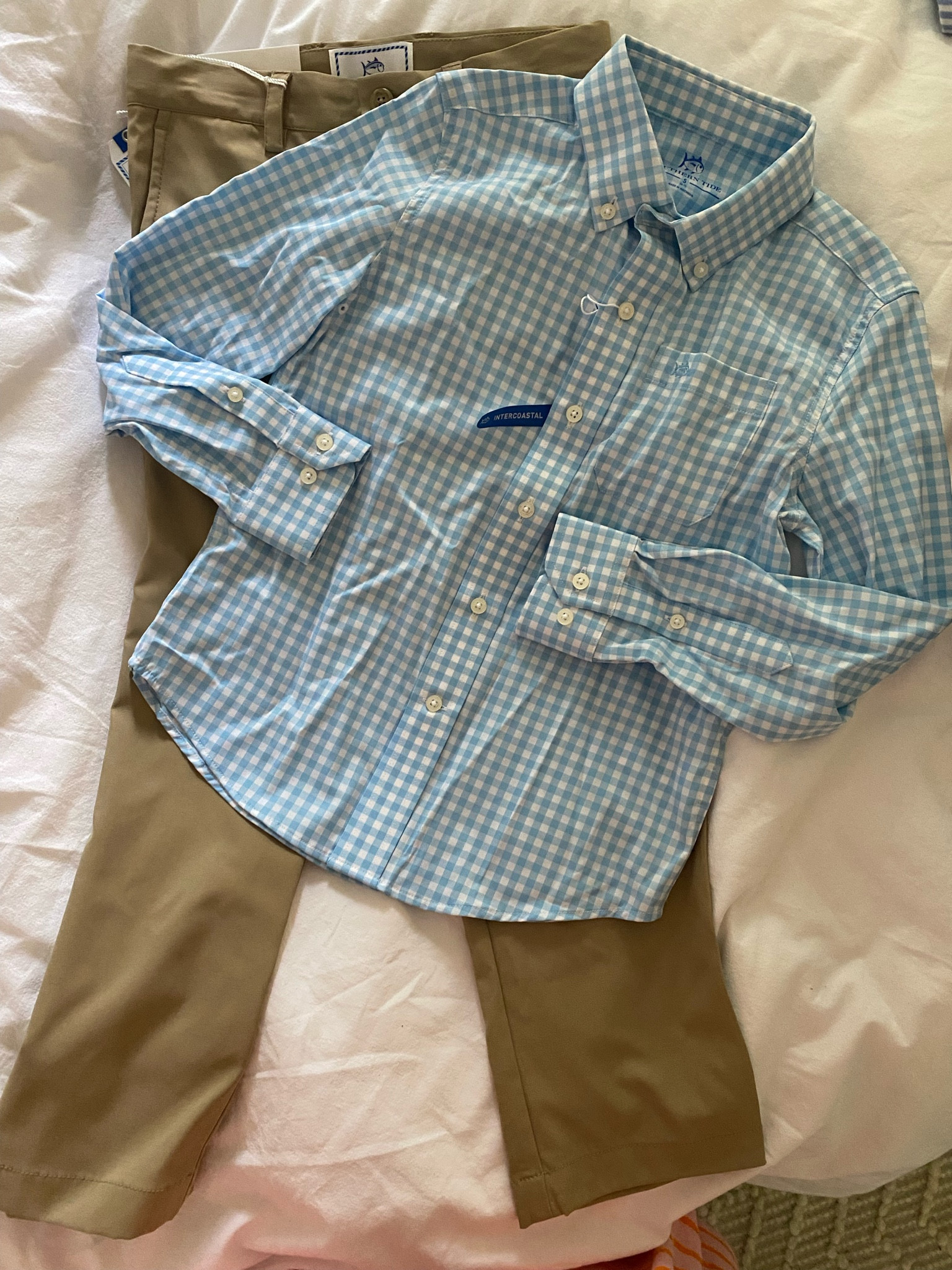 Spring outfit for boys. Loving this gingham blue and white button down and khaki pants 

#LTKunder100 #LTKkids #LTKSeasonal