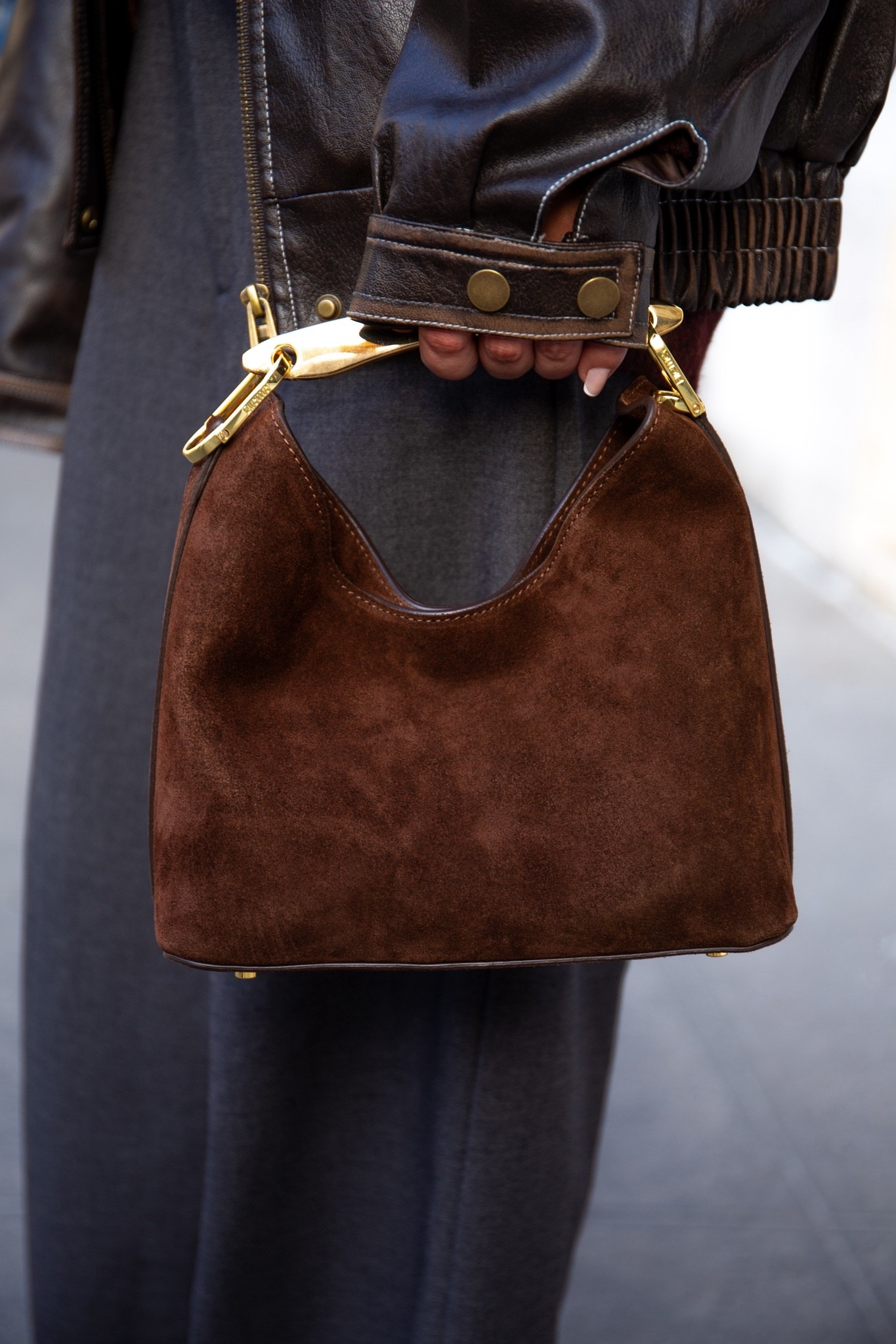 With its compact size, luxurious craftsmanship, and sophisticated metal top handle, the Boomerang Small pays homage to Elleme's signature aesthetic. #elleme #suedebag #brownbag #brownsuede #luxuryhandbag



#LTKootd #LTKOver40 #LTKSeasonal