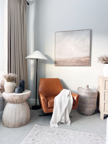 Bedroom cozy corner with leather swivel chair. I love this side table

#LTKstyletip #LTKFind #LTKhome