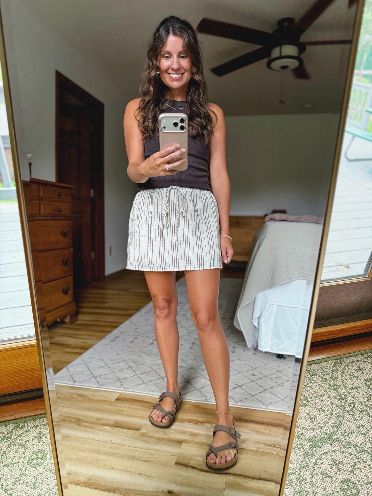 Easy mom outfit🤎 This skirt with built in shorts is soooo cute! Comes in a couple other colors too.

Small in my bra, small in my tank and xs in my skirt/skort. My sandals are size 36.

Im 5’1” and around 100lbs for reference

#LTKPetite #LTKSeasonal #LTKootd