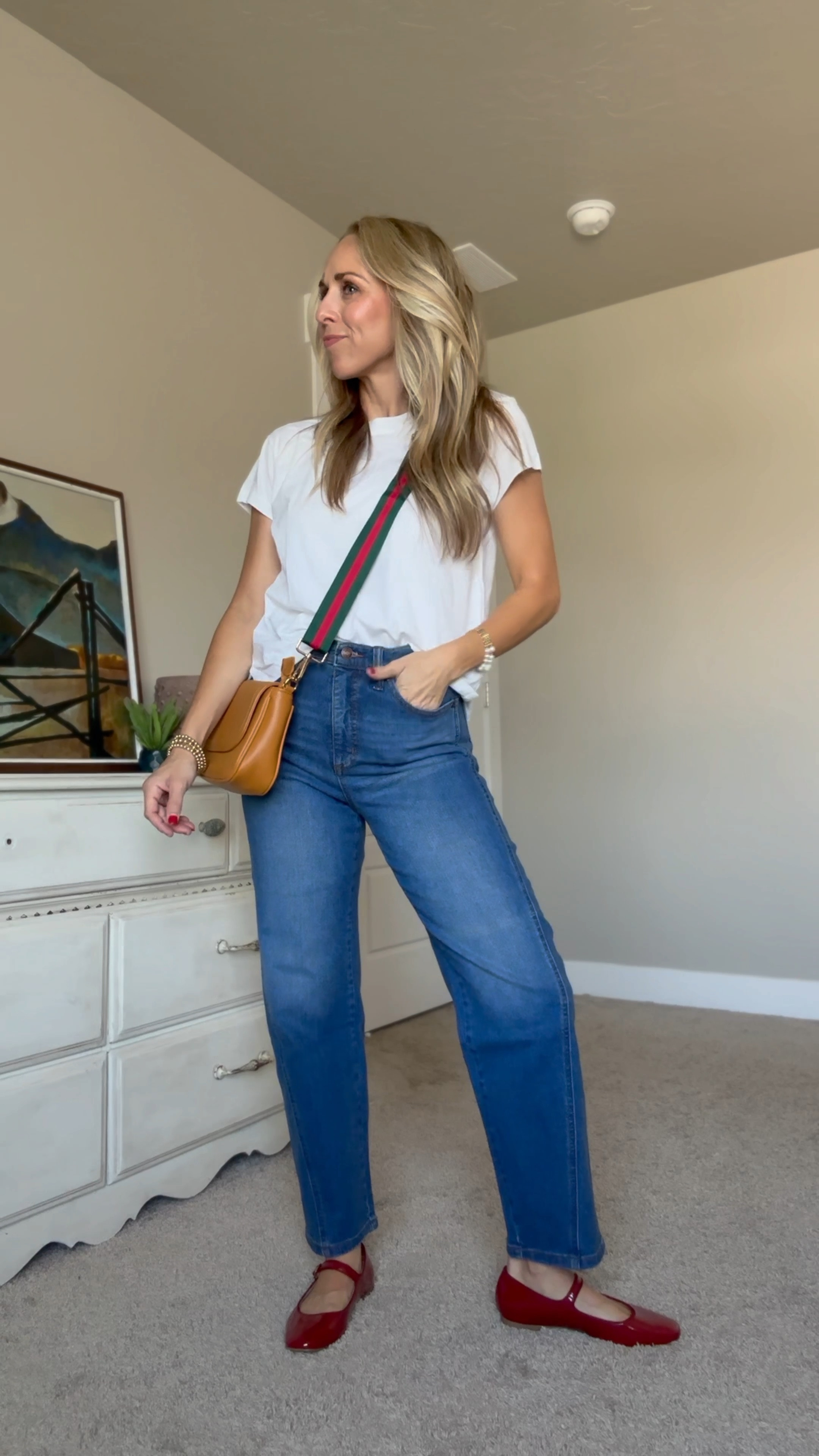 Jeans and a white tee are the perfect mom outfit! Love this fun Amazon purse and red Walmart shoes to spice things up a little bit. 

Everything is true to size. 

#LTKFindsUnder50 #LTKStyleTip #LTKSeasonal