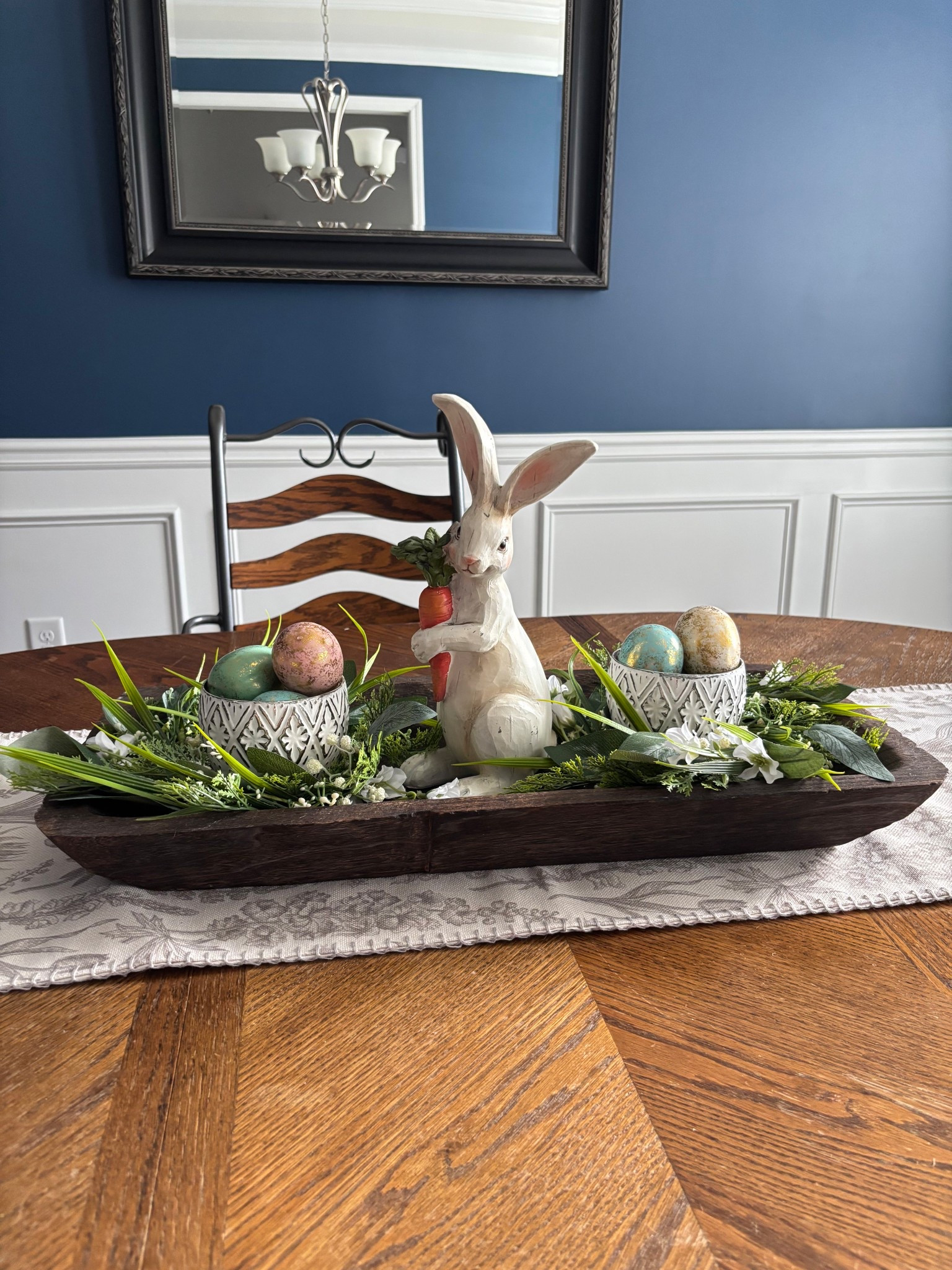 Easter Centerpiece using some things I had, a bunny borrowed from my mom and the mini wreaths from @Michaels to tie it all together.