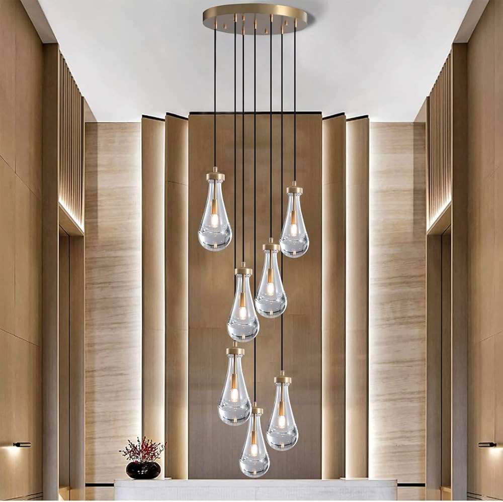 RINGRAIN 7-Lights Brass Raindrop Pendant Light, Gold Modern Teardrop Crystal Chandelier for Livin... | Amazon (US)