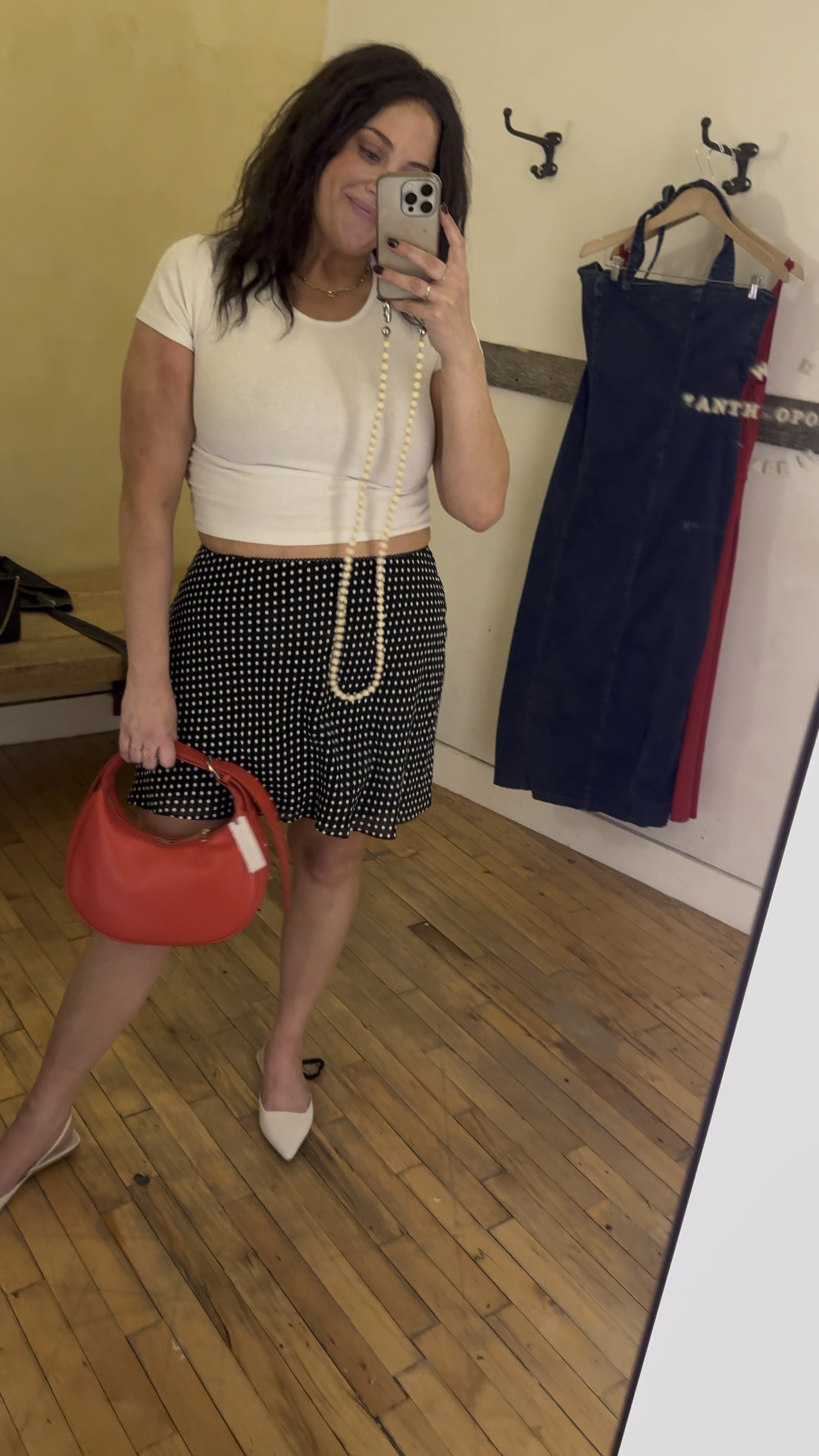 Cutie little reformation skirt on sale! I think this is the best style. Love idea of it with tights too. I’m in XL. Love the pop of red and a favorite cropped tee

#LTKfindsunder100 #LTKsalealert #LTKSpringSale