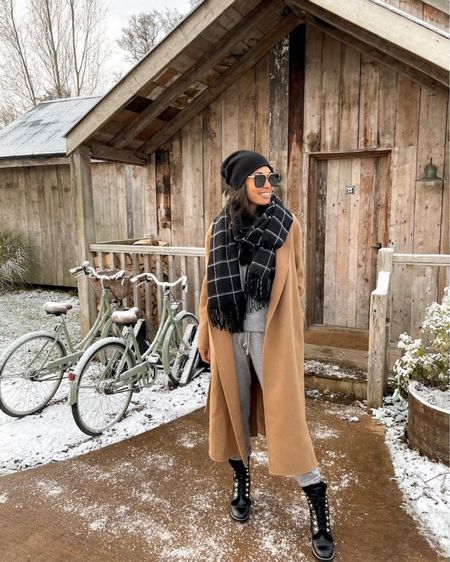 Kat Jamieson of With Love From Kat shares a winter outfit. Neutral beanie, black scarf, snow boots, winter style, brown coat, neutral outfit. 

#LTKSeasonal