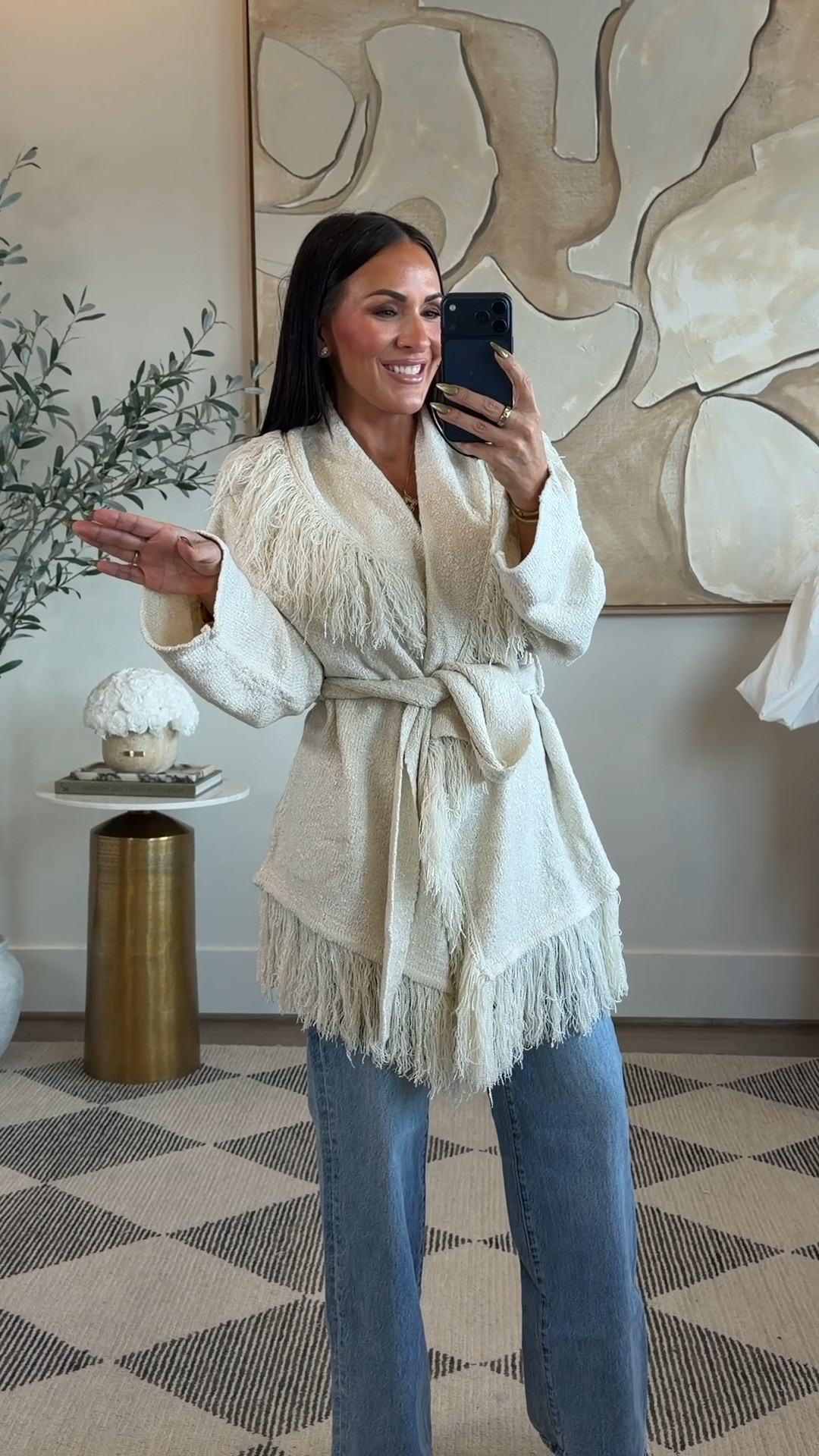 Okay THIS one. 🤍

The belted waist + all that fringe makes it feel so much more elevated than your typical cardigan. Cozy, but still makes the outfit.