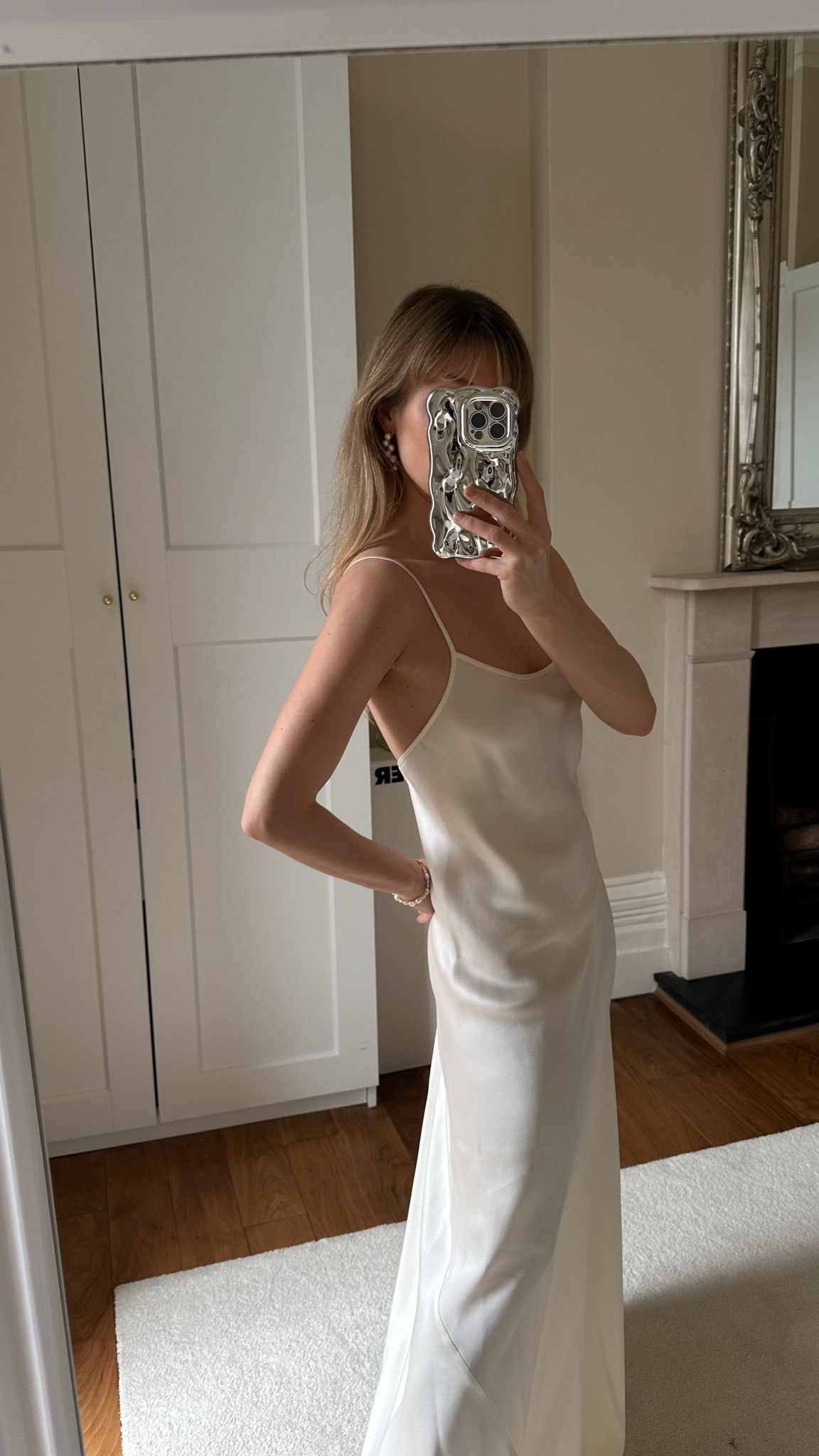 Occasion wear 
Victoria Beckham long white satin dress 
Open 
Maxi dress

minimalist and elegant design satin slip dress


#LTKeurope #LTKstyletip #LTKparties