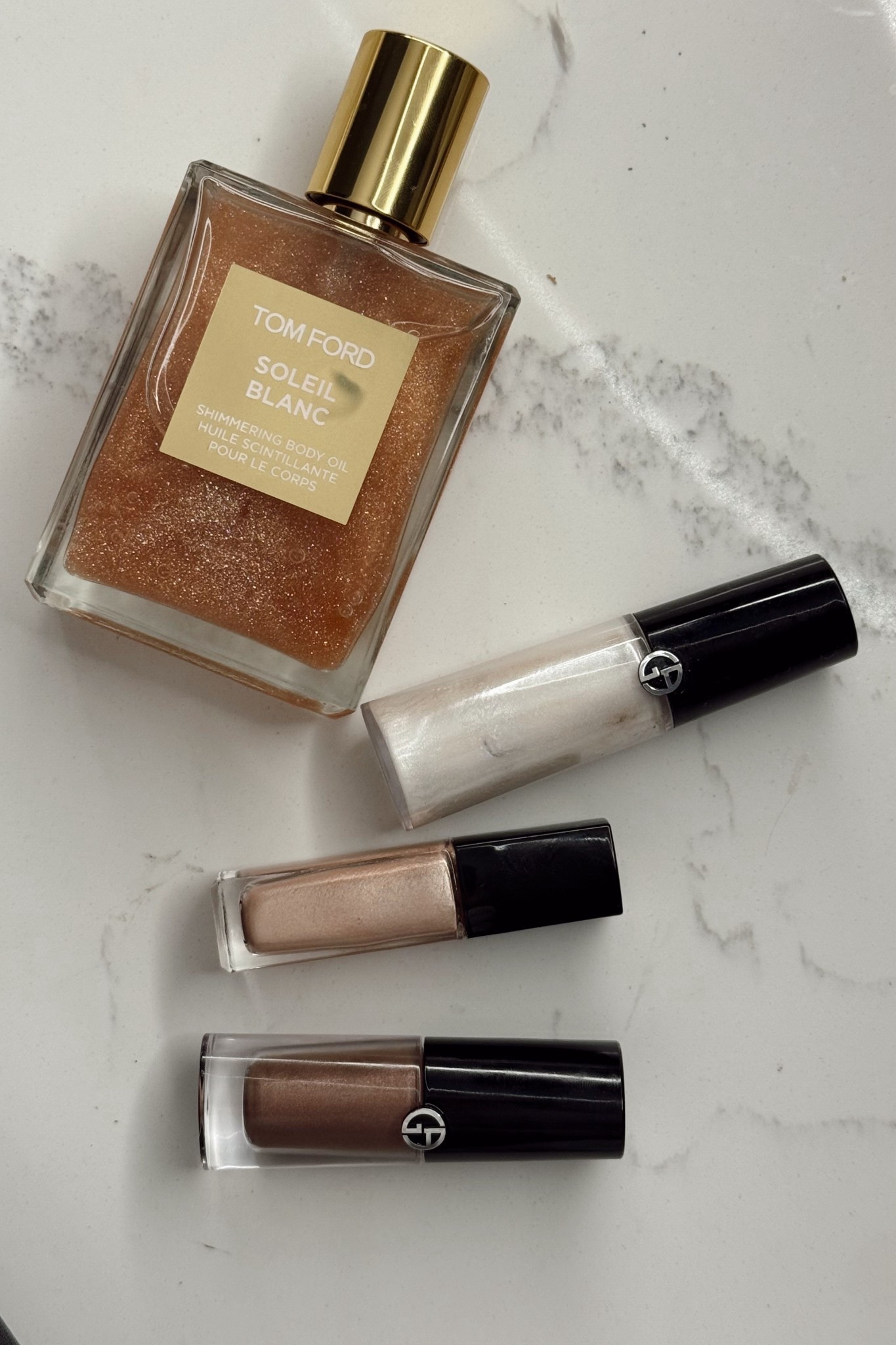 My latest Nordstrom finds were exactly what I needed to perfect my LTKCON luggage lineup. Bling and shimmer!

Tom ford shimmering body oil 
Armani highlighter - color 1
Chanel eye shadow - color 22 
Armani eye shadow - color 67S

@nordstrombeauty #nordstrompartner

#LTKCon #LTKBeauty #LTKParties