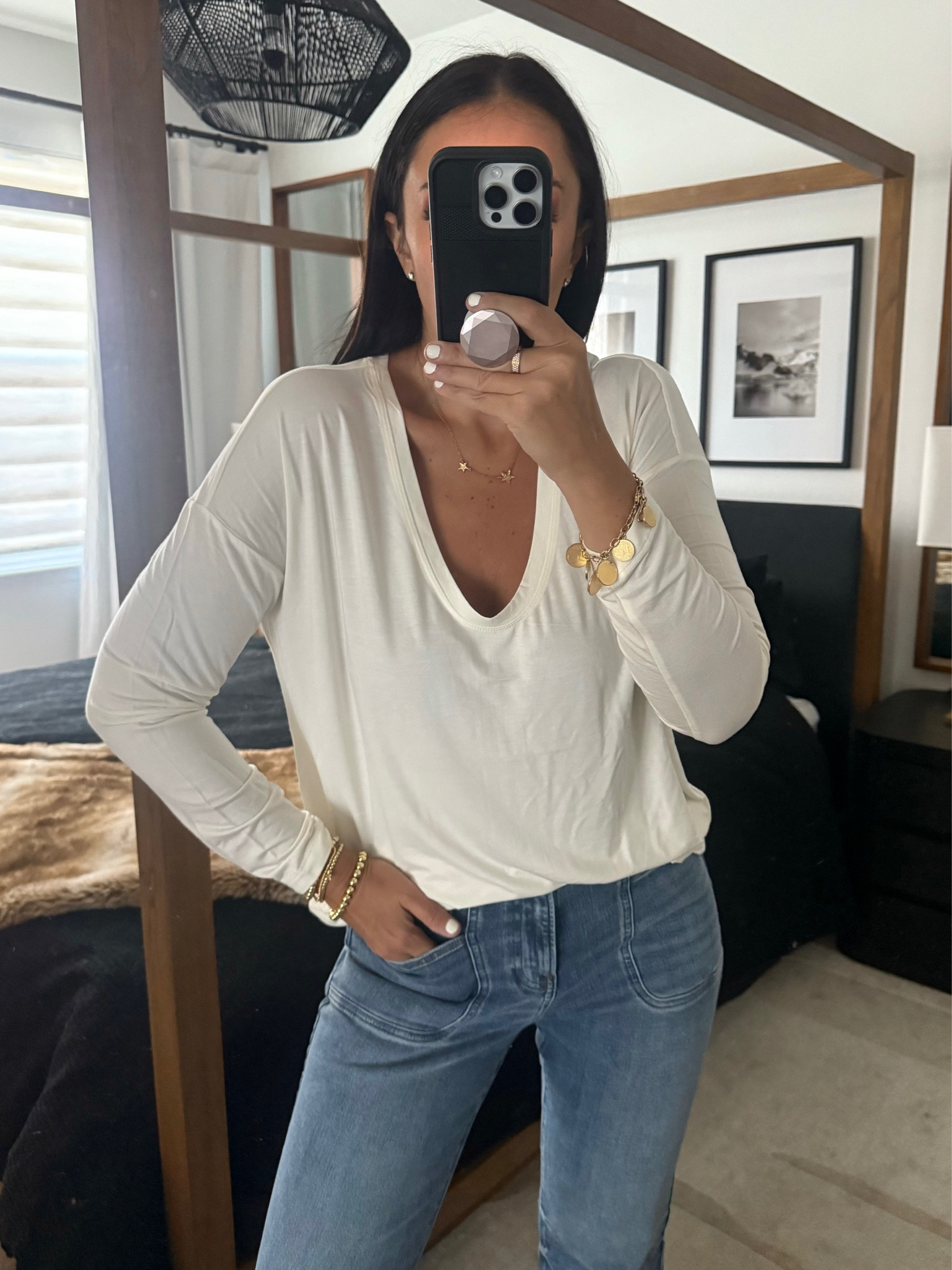 Mid Rise Medium Wash FlexX '70s Flare Jeans. Supersoft Relaxed V-Neck Long Sleeve Tee
