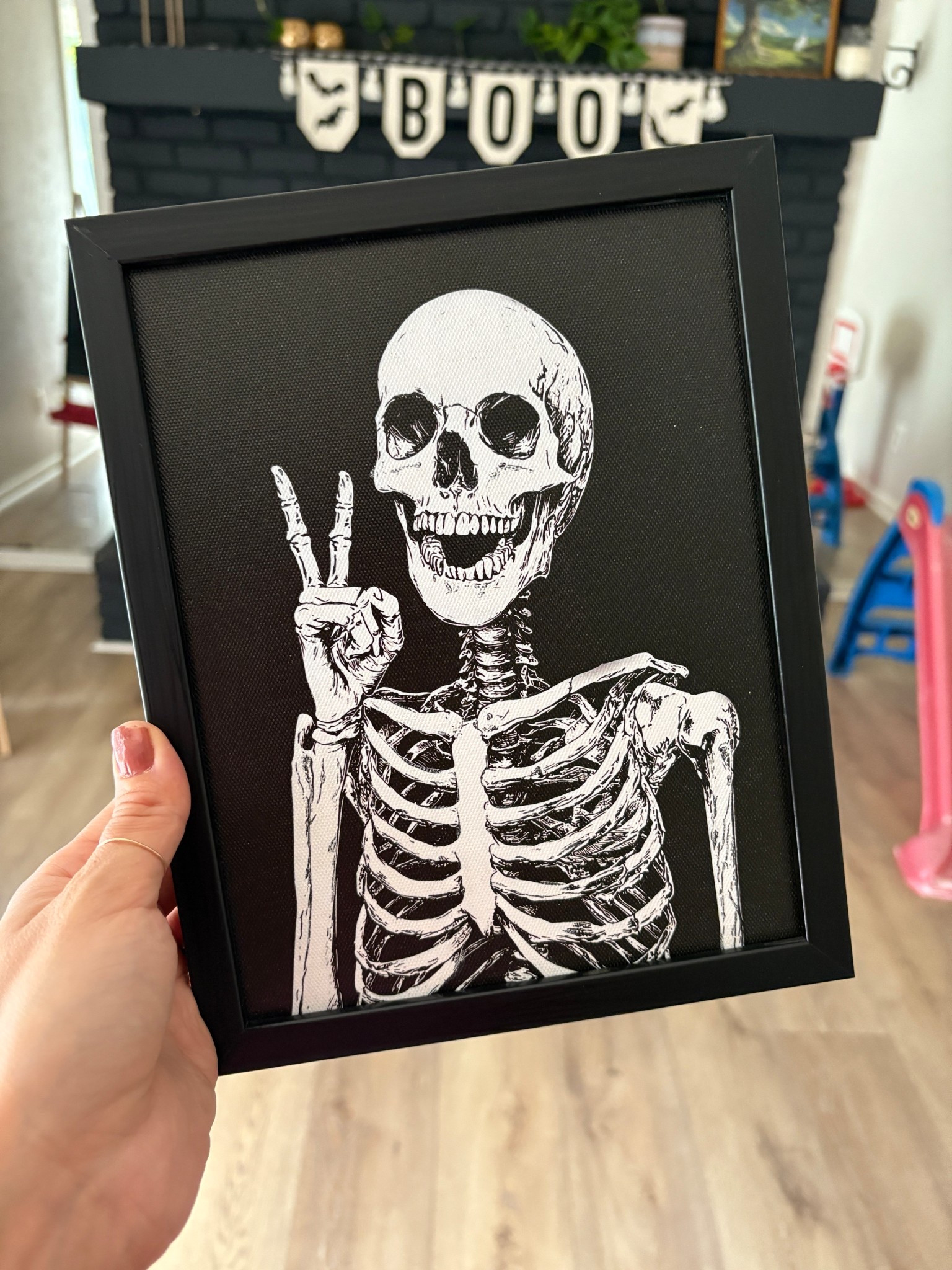 ✨ Couldn’t stop thinking about this find, so you know I had to grab it! If it’s under $10 and I’ve got a voucher… it’s coming home with me 🖤 This black + white skeleton frame giving the peace sign is the perfect mix of spooky + fun. Such an affordable Halloween home decor piece you’ll use year after year! Linking all my fave Michael’s Halloween finds so you can shop them too. 👻 

#LTKSeasonal #LTKSaleAlert #LTKHome