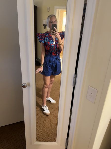 Last morning on SSI, so last OOTD in the skinny mirror in our dark room. We head back in the road this afternoon to head for home. We’re only driving part of the way, so who knows what mirror selfie you’ll get tomorrow! 😂

This print on my Avara shirt is EVERYTHING! I had it in a dress last year that I adored and wore over and over again. The shorts are also Avara. I sized up to a large but shouldn’t have. They are true to size and long enough for 5’8 me.  

#LTKMidsize #LTKTravel #LTKOver40