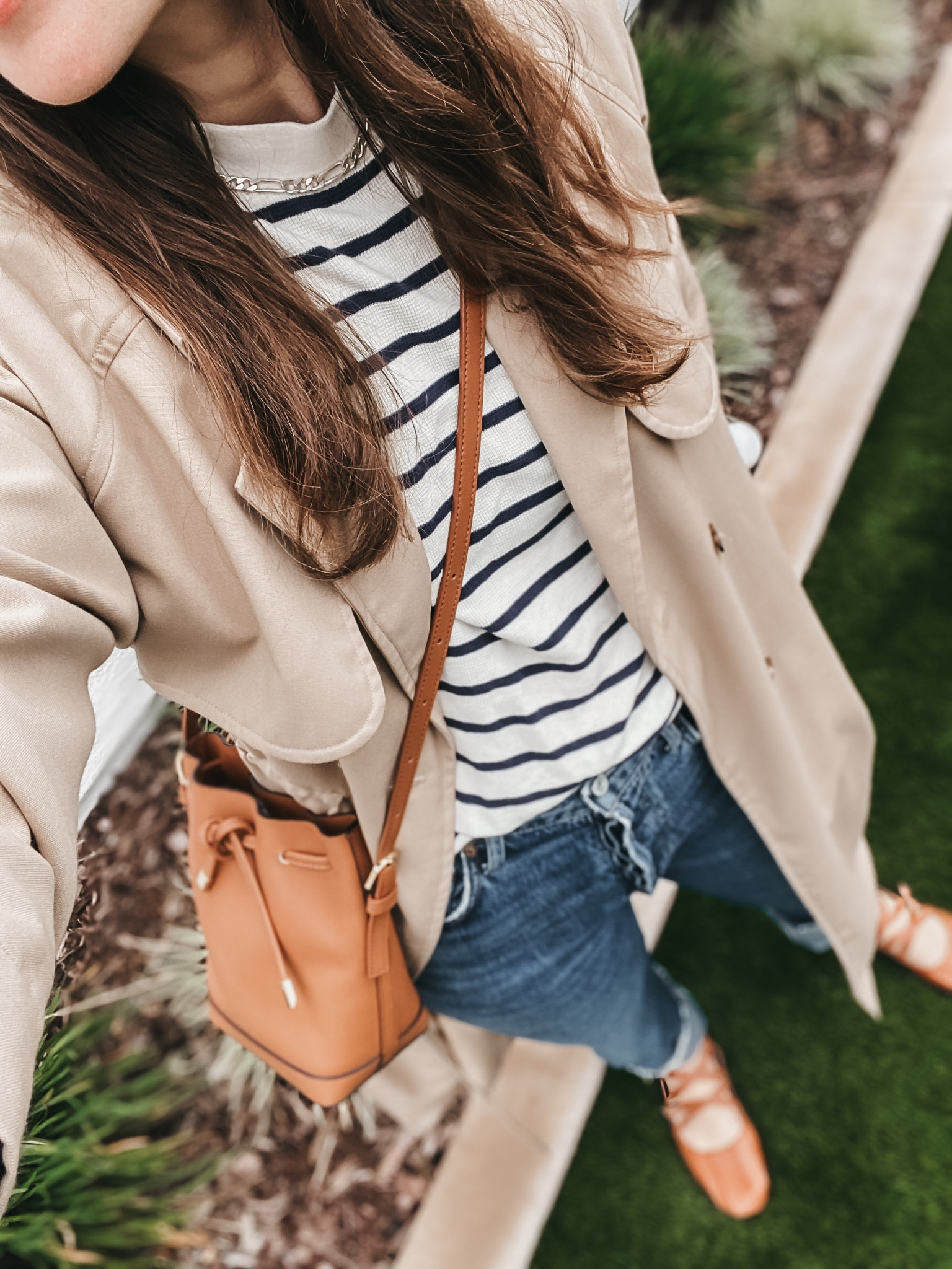 Coat is my new exclusive at ABLEClothing.com the Kimberly Trench Coat 20% off with code: ALEX20  TTS

Shoes are the Obsession Ballet Flat from Bali Elf code: ALEX20 

Jeans go with your smaller size. They are a hard denim that does relax after breaking in   

Bag the Baby Always bucket bag at Paris64 World 

Stripes are sold out from Able last fall. 

Necklace is vintage  

#LTKshoecrush #LTKSpringSale #LTKSeasonal