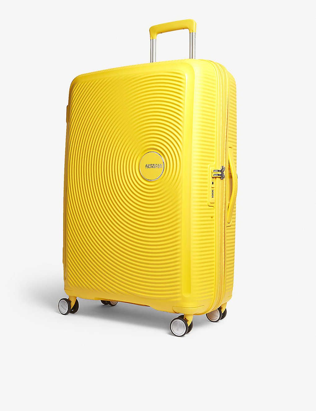 Soundbox expandable four-wheel suitcase 77cm | Selfridges