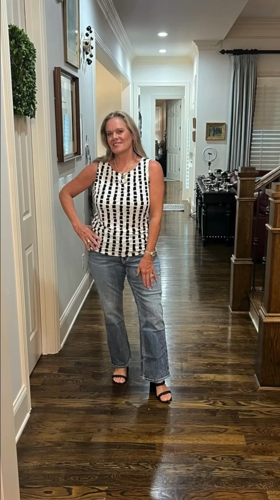 Do you ever have those days when you’re feeling puffy?
We just got back from a trip and spent the day before driving 7 hours home.
I didn’t get to fit in a workout and eating at drive-thru restaurants definitely was a contributing factor!
Geometric prints can help camouflage the tummy when you’re feeling kind of puffy.
The bootcut jeans also even out my legs and give them a longer appearance.
This outfit will keep me in a decent mood while I detox from the junk I ate yesterday!


#LTKMidsize #LTKStyleTip #LTKOver40