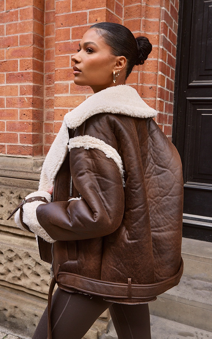 Brown Borg Trim Belted Hem Faux Leather Aviator Jacket | PrettyLittleThing US