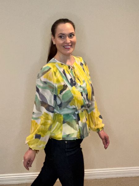 This yellow print is so pretty for Spring and Summer. The chiffon blouse is pleated and has an elastic waist. The neck tie can be closed or worn open as a v-neck. The blouse looks great over jeans, pants or a skirt. It’s a great travel piece too if you’re going somewhere this Summer where it’s cooler at night and you want a longer sleeve. I paired the top with WHBM skinny flare jeans in Midnight. 

#LTKstyletip #LTKover40 #LTKSeasonal