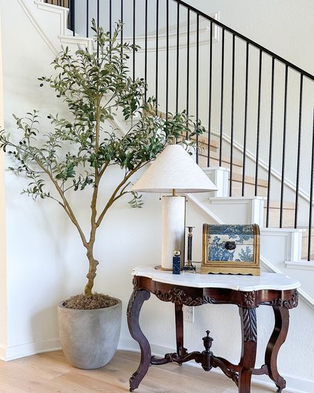 My favorite Amazon olive tree and planter! The price on this tree is amazing! I elevated this inside with packaging to give it almost an extra foot of height! It has such a beautiful, modern organic look!

entryway decor, lamp, faux tree

#LTKstyletip #LTKhome #LTKsalealert