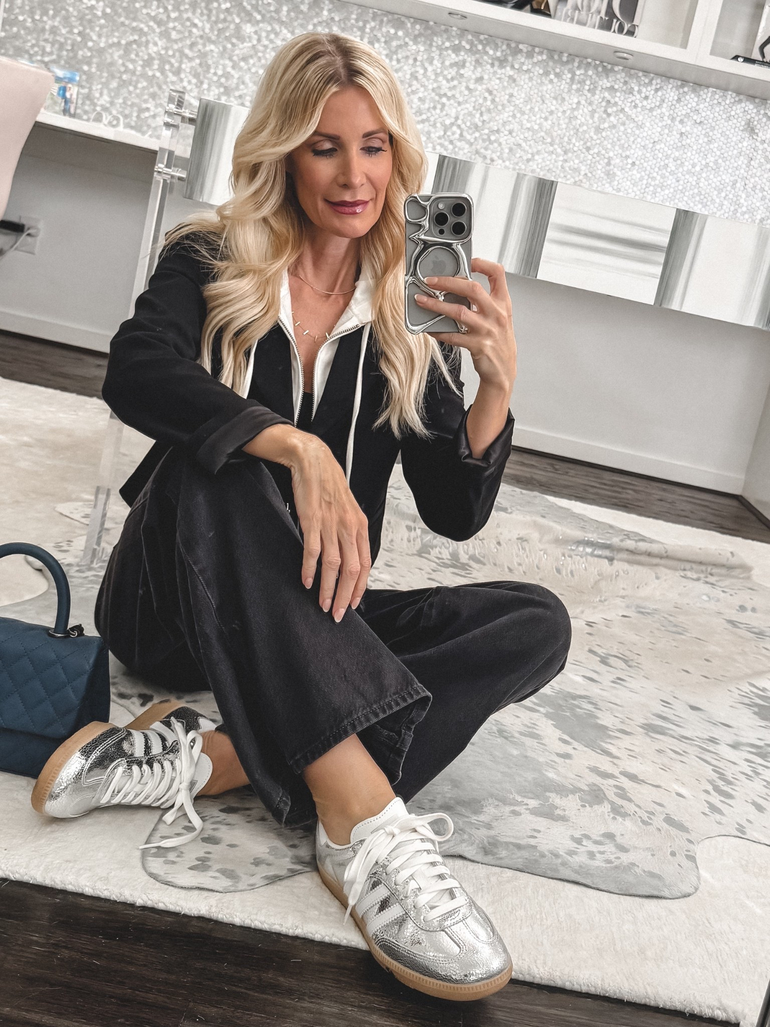 Metallic sneakers are having such a moment, and this pair of Silver Addidas Sambas are SO comfortable with the best price point. They instantly make a casual outfit look more elevated while still feeling easy and wearable. Tell me you’re into the metallic sneaker trend too ✨👟 XS in blazer, 24 in jeans. 

 #LTKootd #LTKSeasonal #LTKOver40